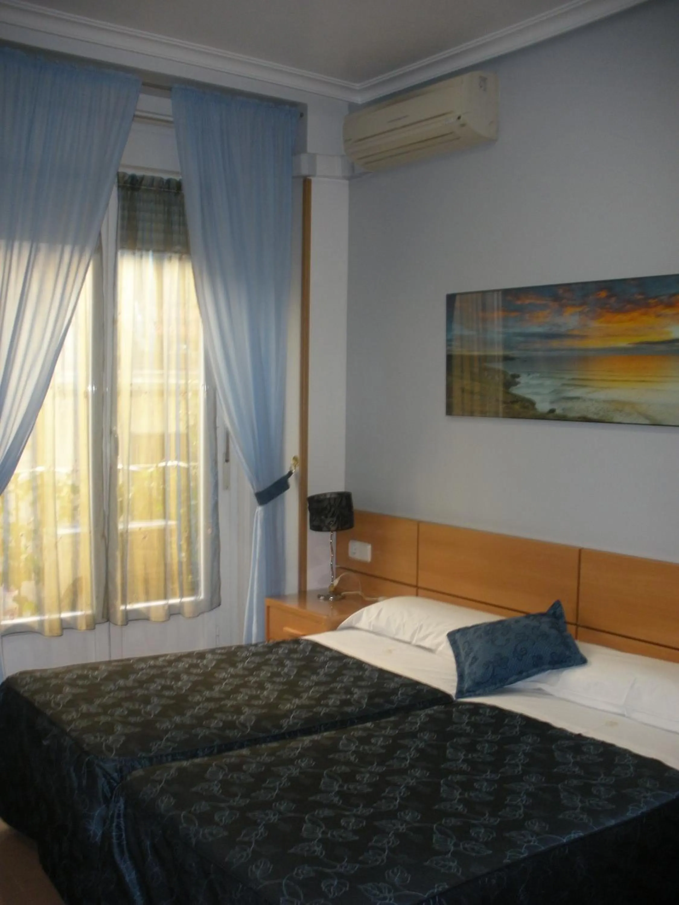 Photo of the whole room, Bed in Hostal del Pez Azul