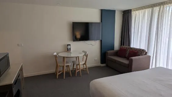Seating area, Bed in Wyndham Resort Torquay