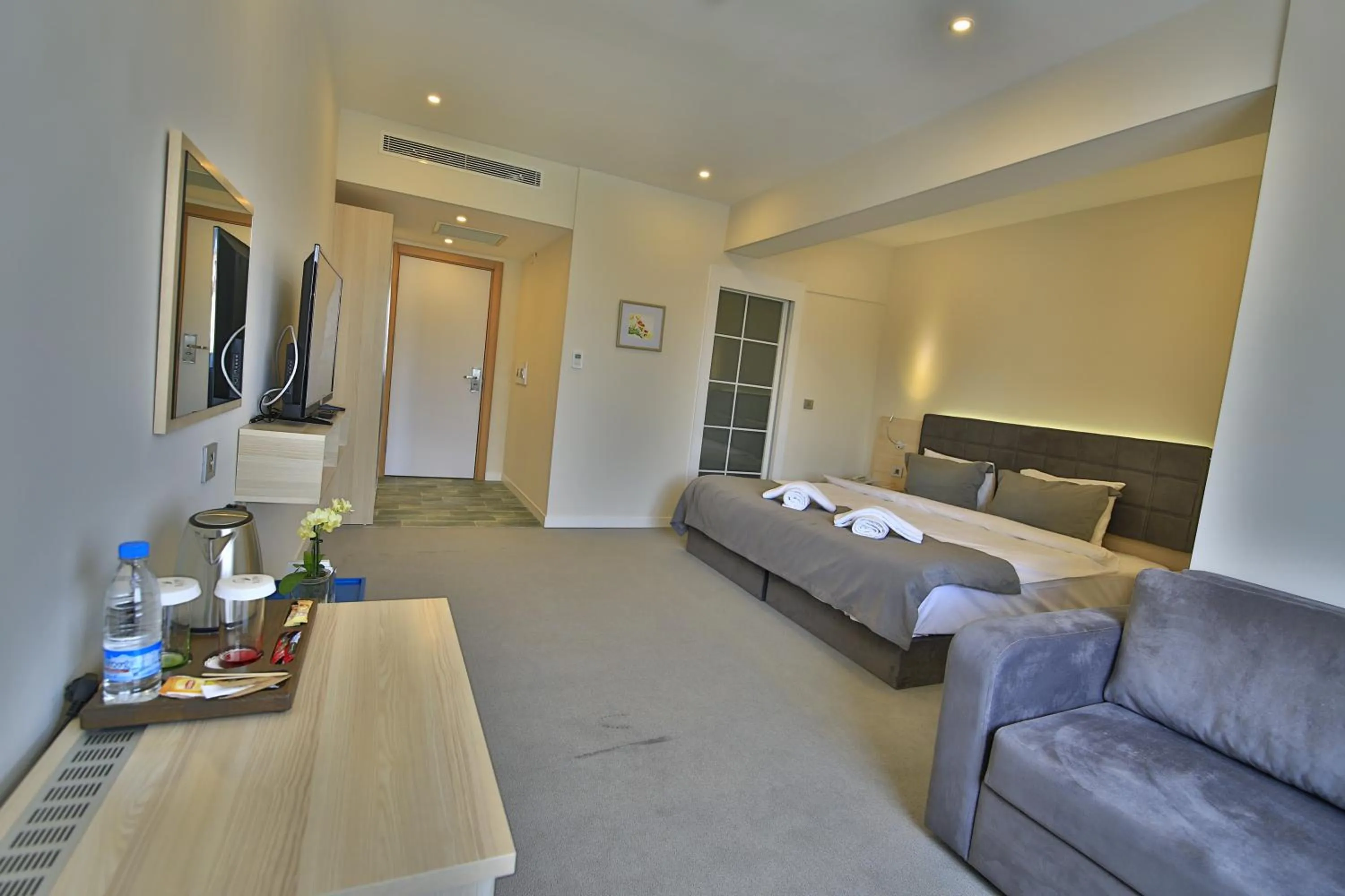 Living room, Bed in leto city hotel