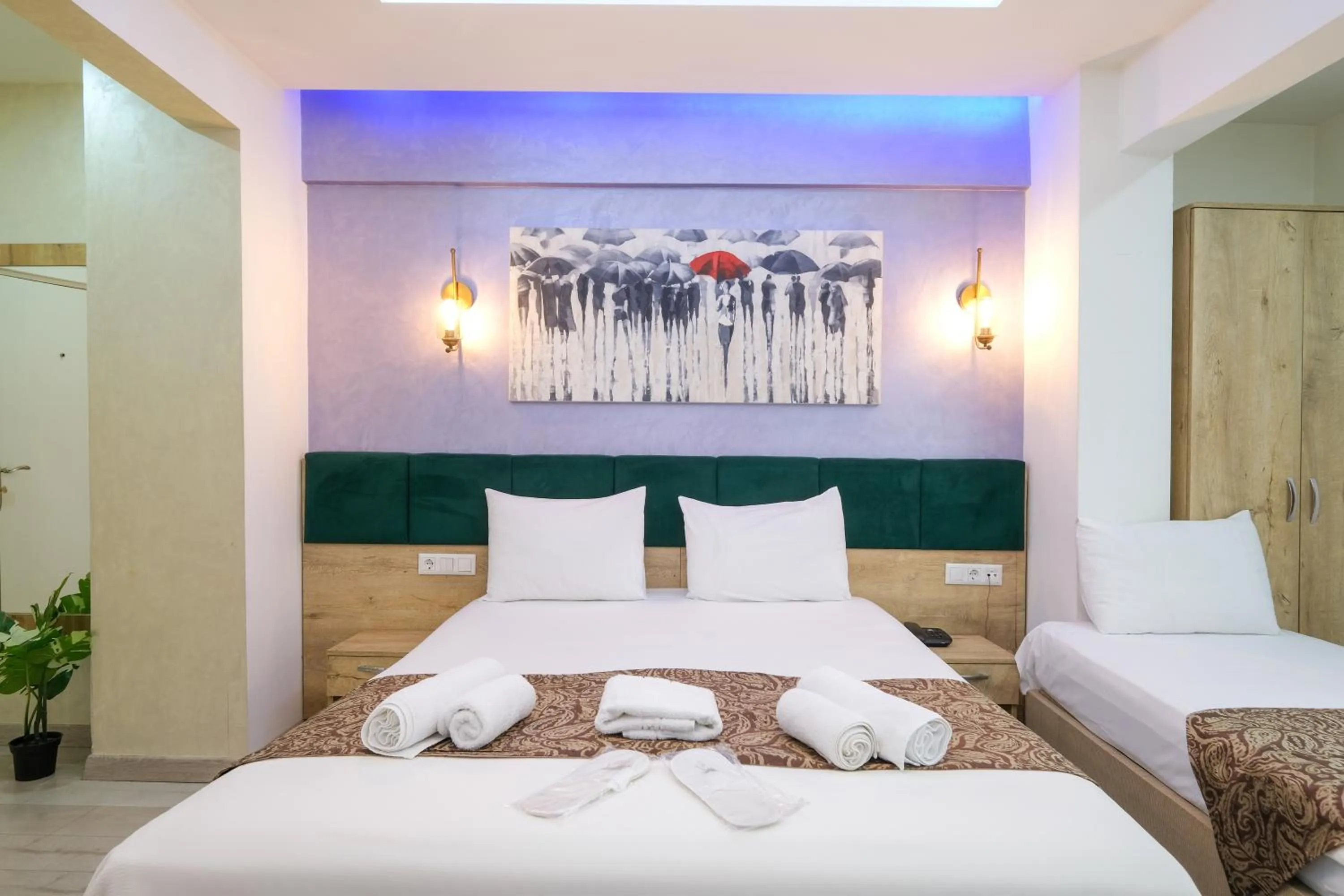 Bed in Loren Hotel&Suites