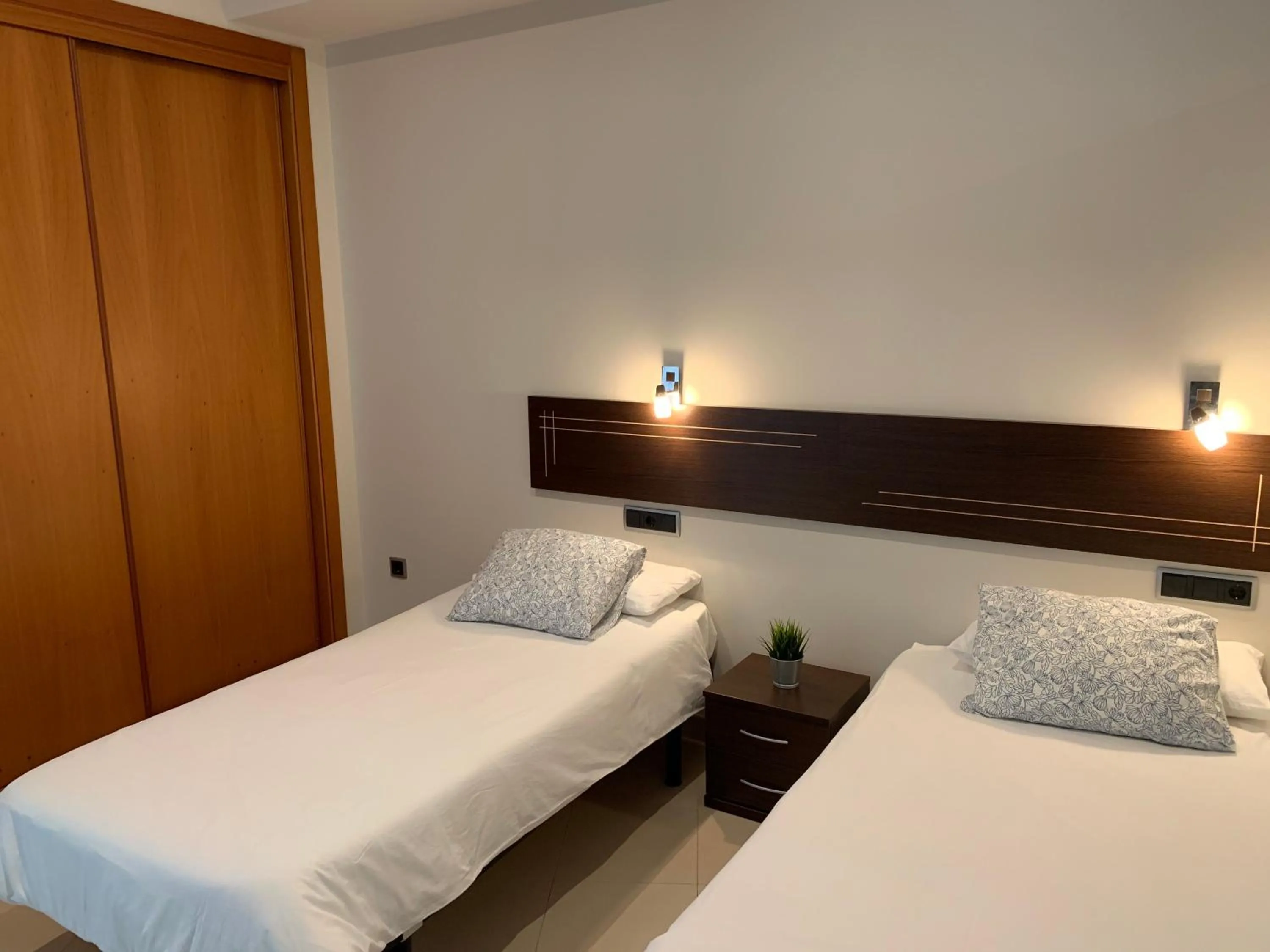 Bedroom, Bed in Apartamentos Arosa
