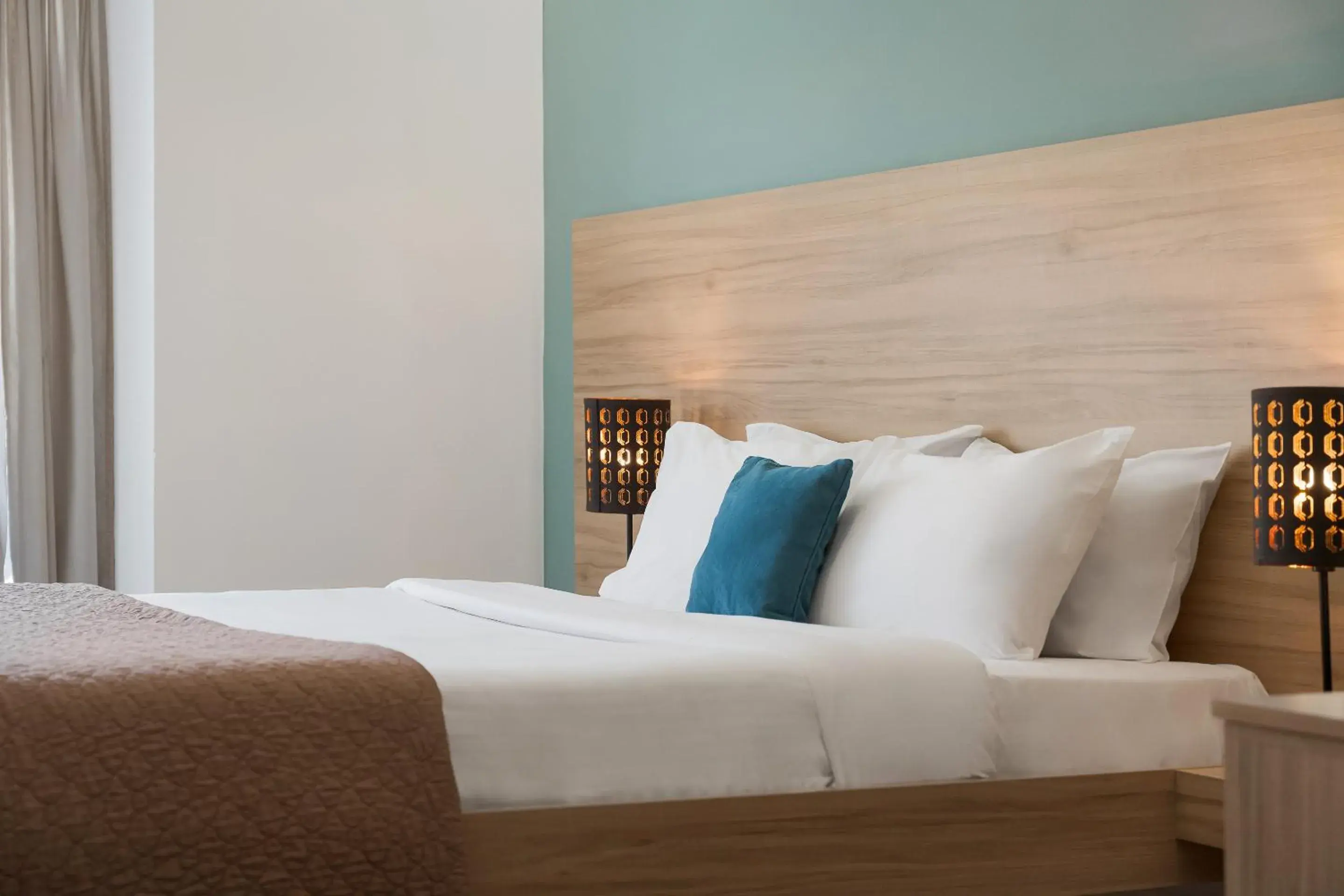 Bed in Sette Suites & Rooms - Adults Only Bed in Sette Suites & Rooms - Adults Only