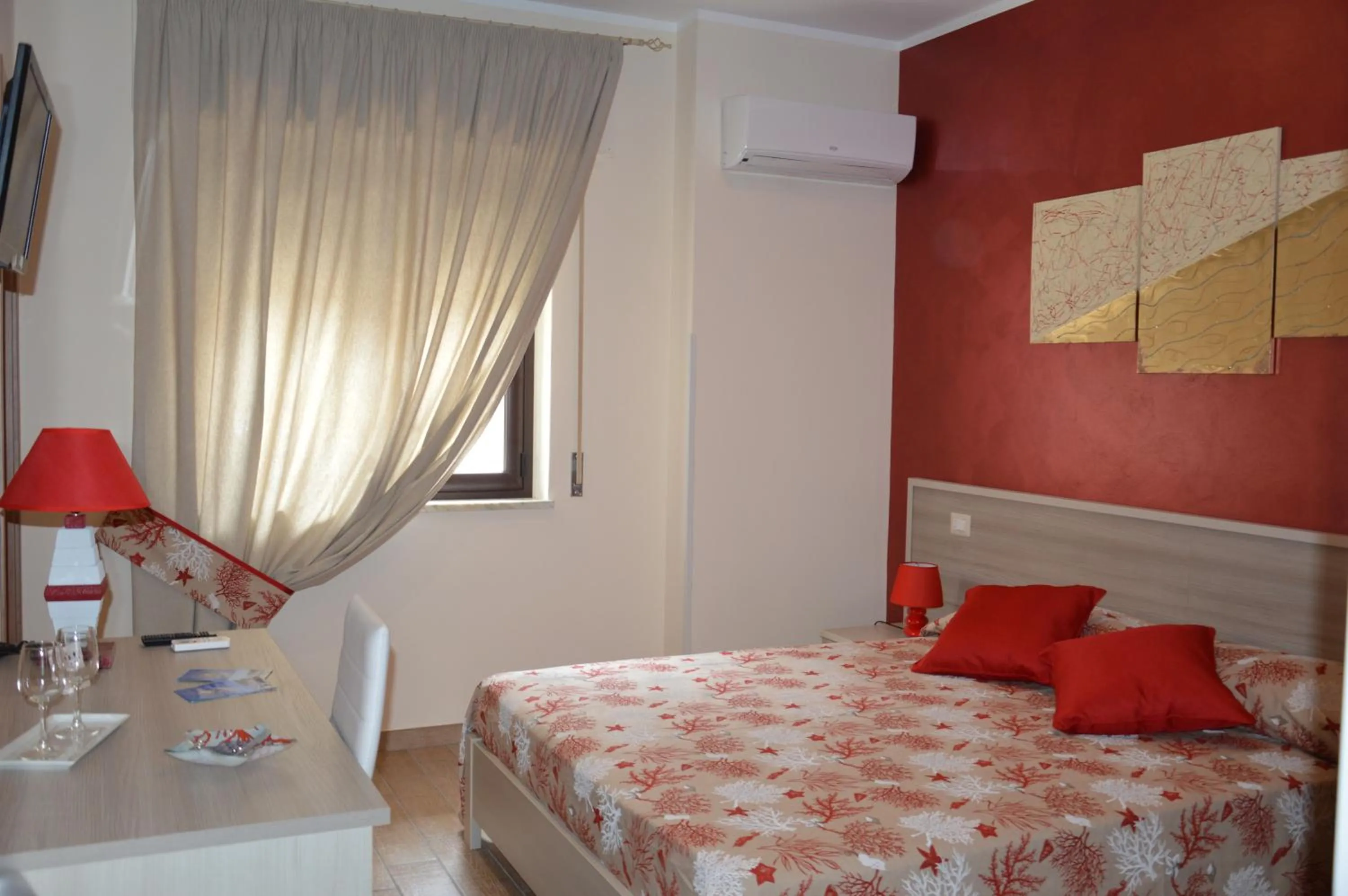Photo of the whole room, Bed in La Conchiglia
