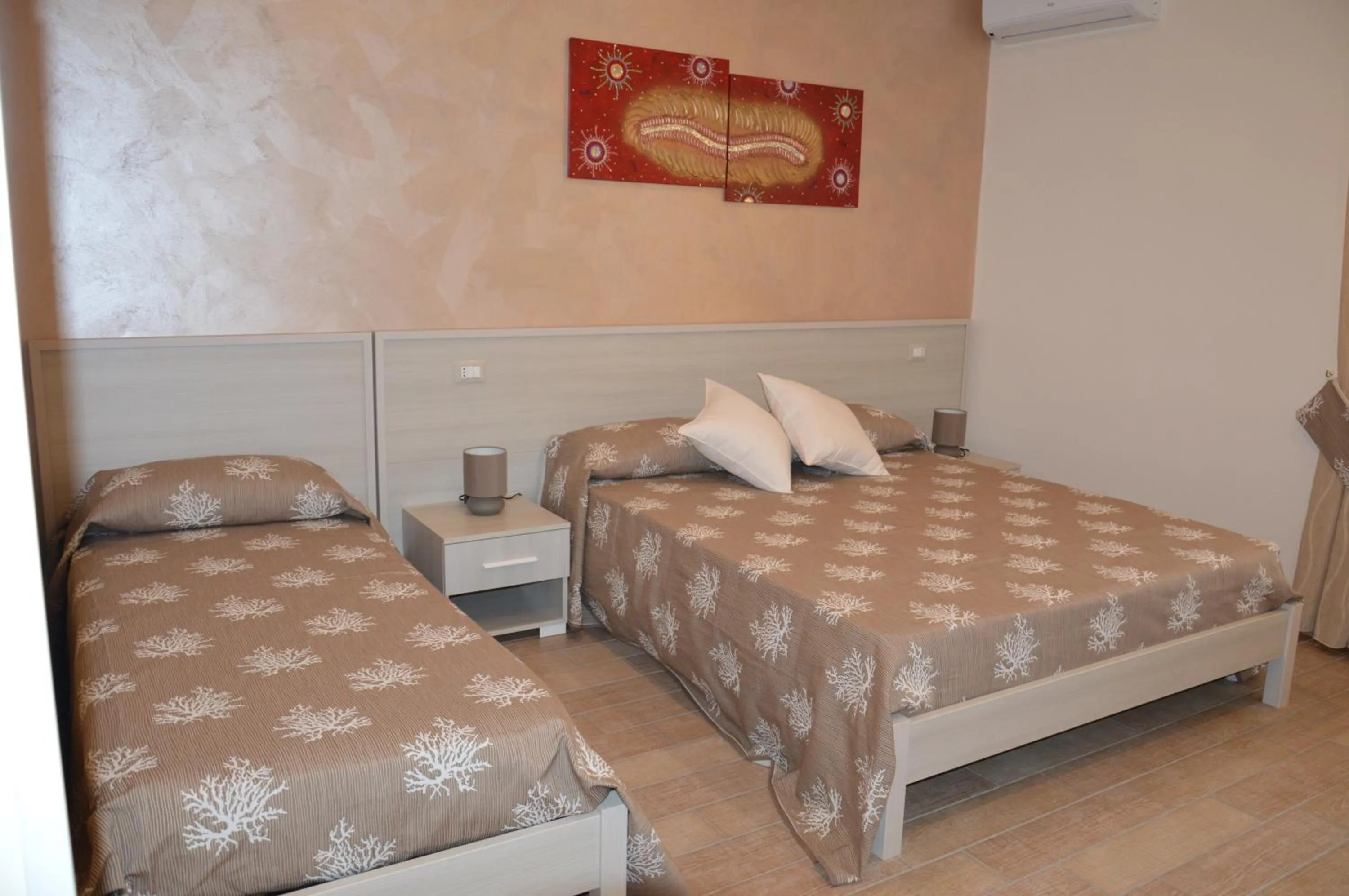 Photo of the whole room, Bed in La Conchiglia