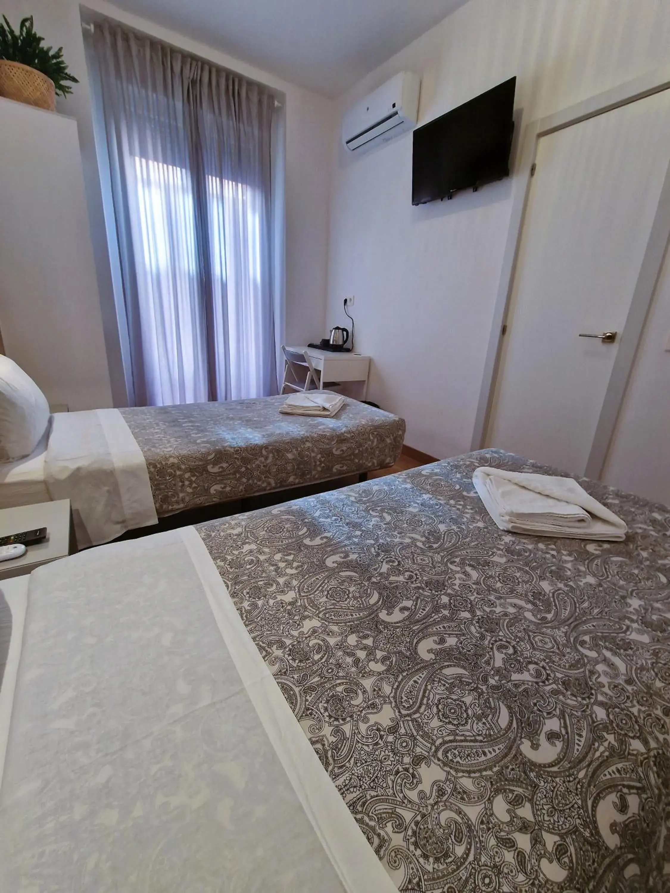 TV and multimedia, Bed in Hostal A Nuestra Senora de La Paloma TV and multimedia, Bed in Hostal A Nuestra Senora de La Paloma