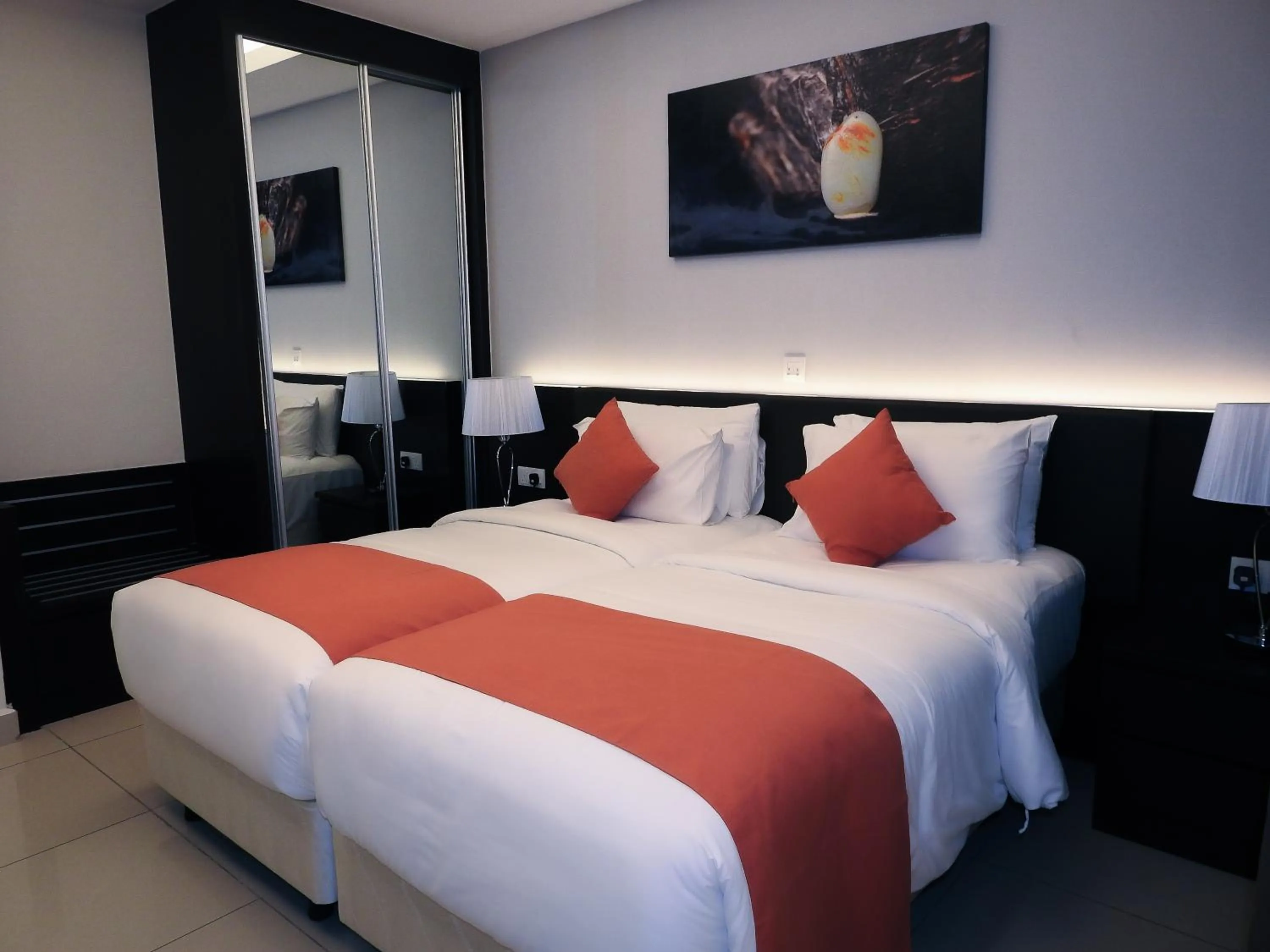 Bed in Grand Ion Delemen Hotel