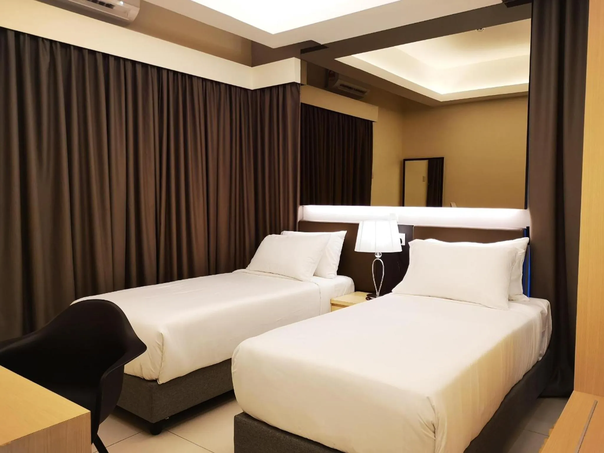 Bed in Grand Ion Delemen Hotel