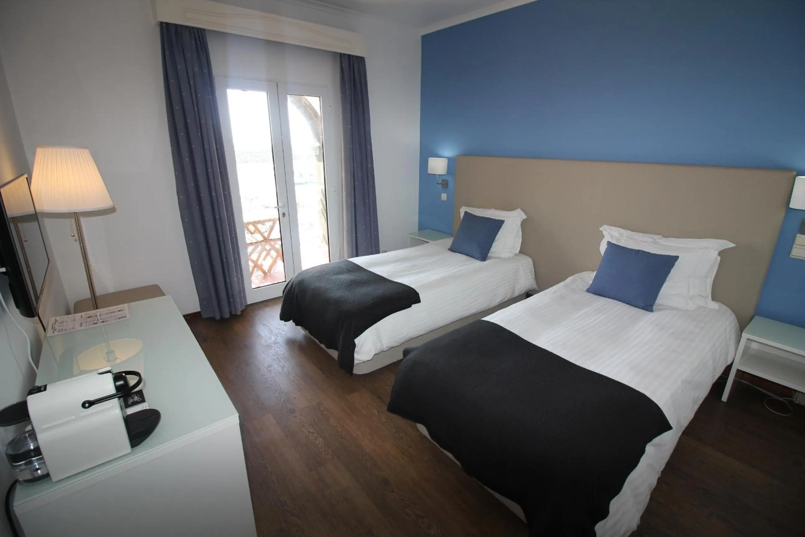Bedroom, Bed in Vinha da Areia Beach Hotel