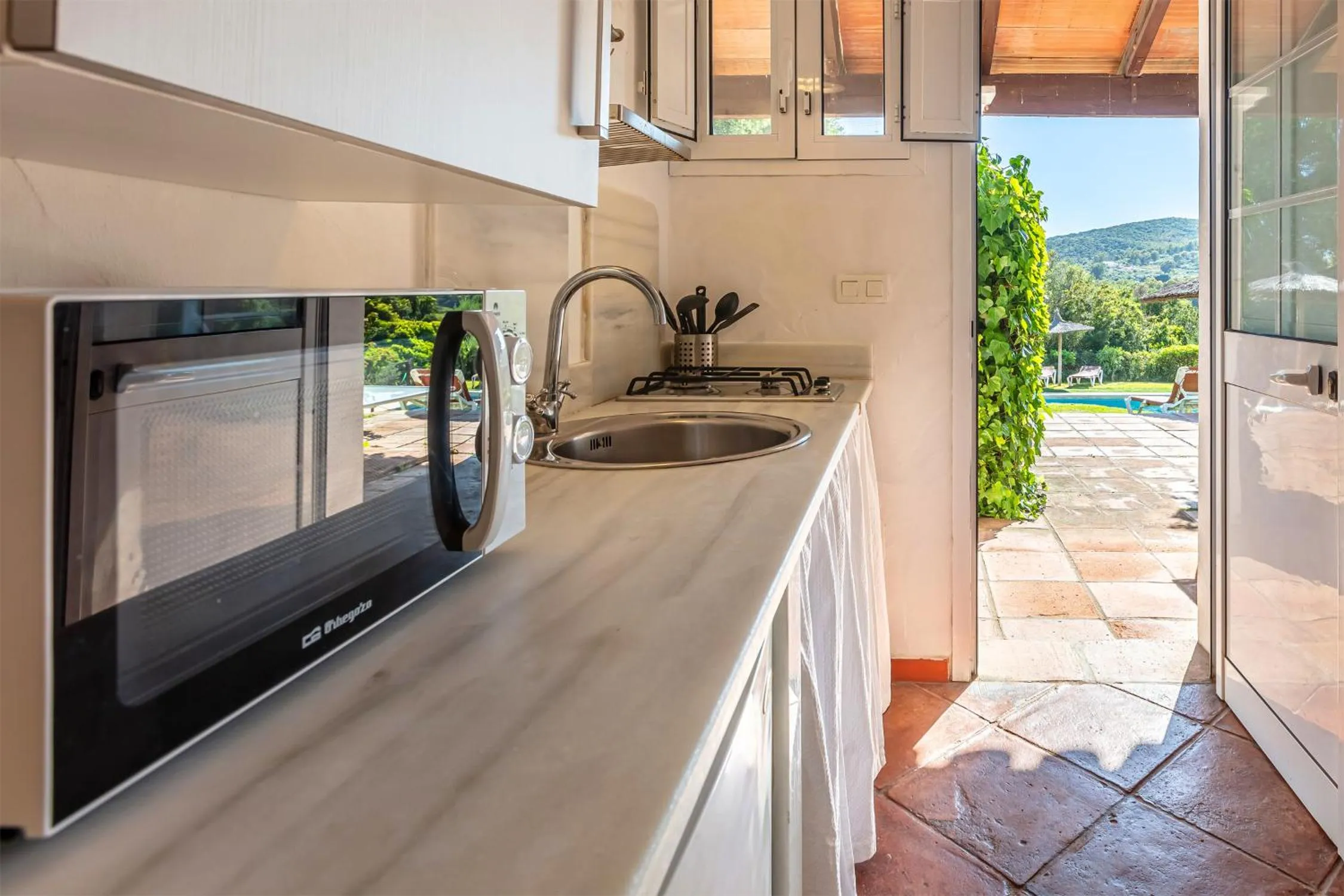 Kitchen or kitchenette in Hotel-Apart CORTIJO LAS PIÑAS