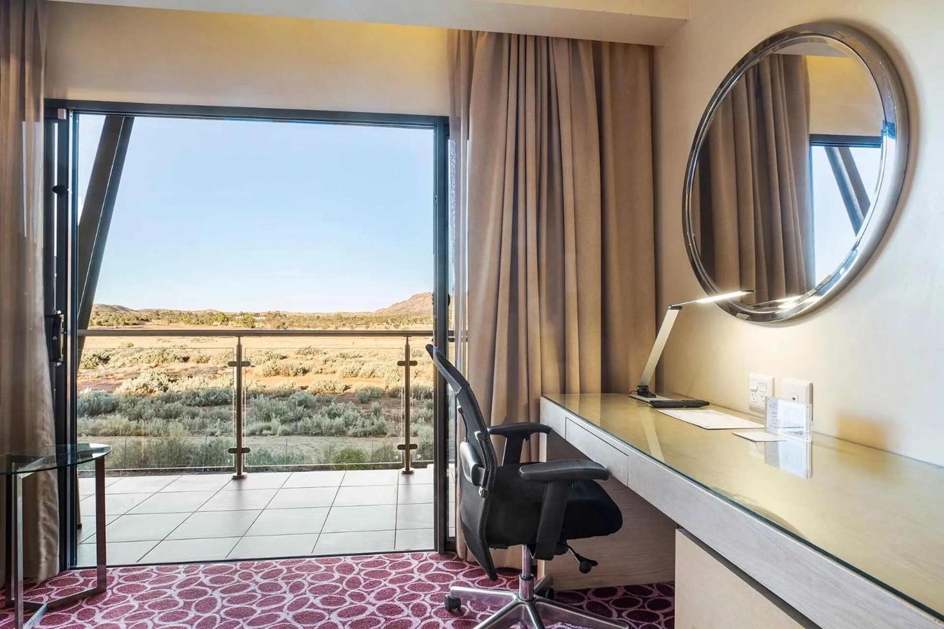 Seating area in Crowne Plaza Alice Springs Lasseters by IHG