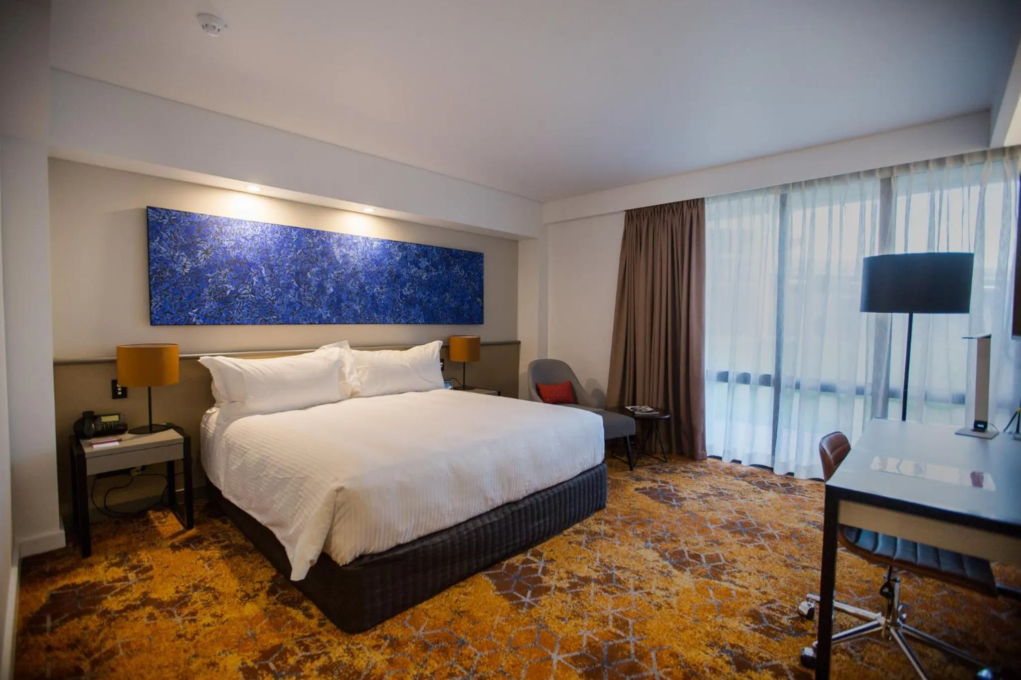 Photo of the whole room, Bed in Crowne Plaza Alice Springs Lasseters by IHG