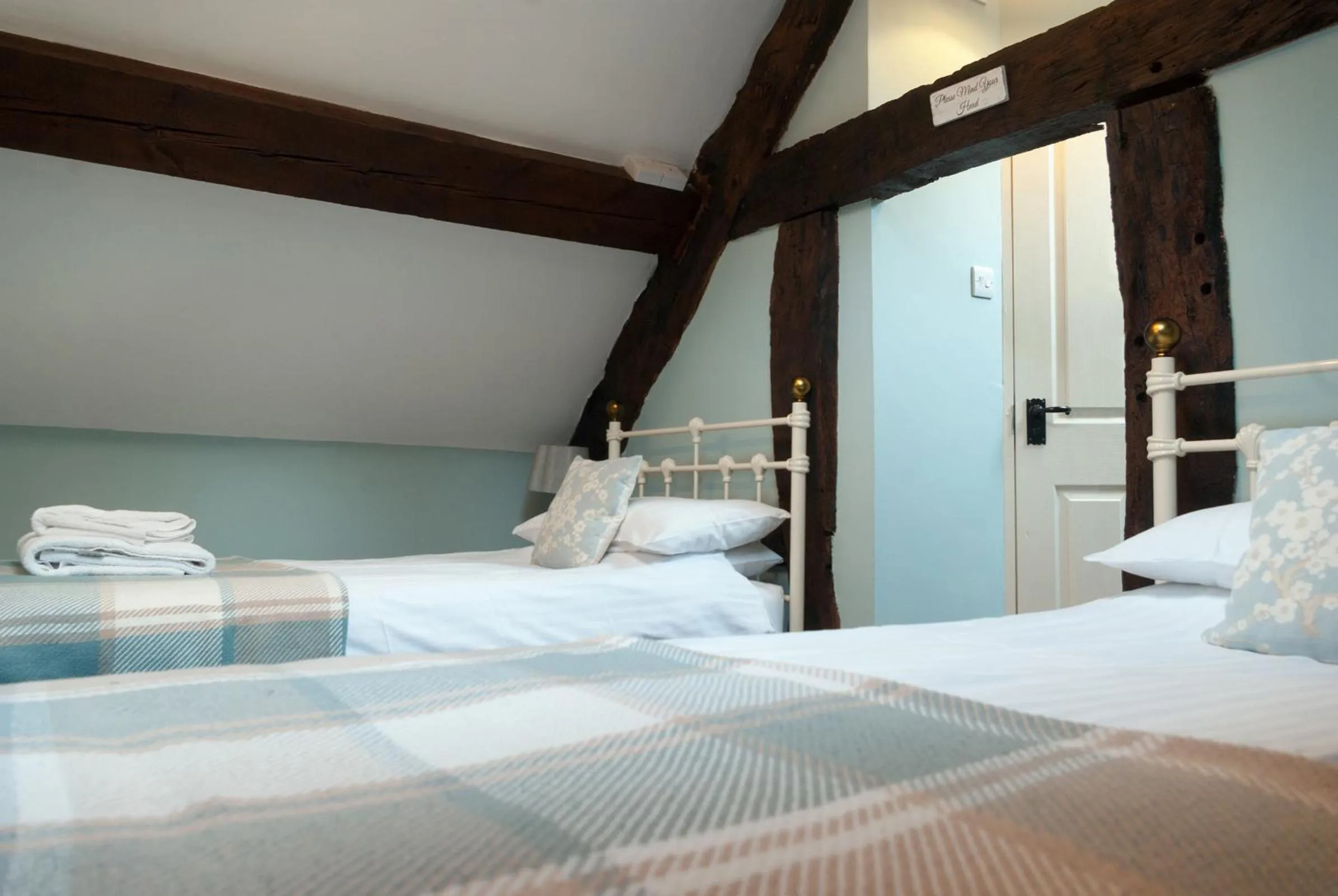 Decorative detail, Bed in The Dragon Hotel