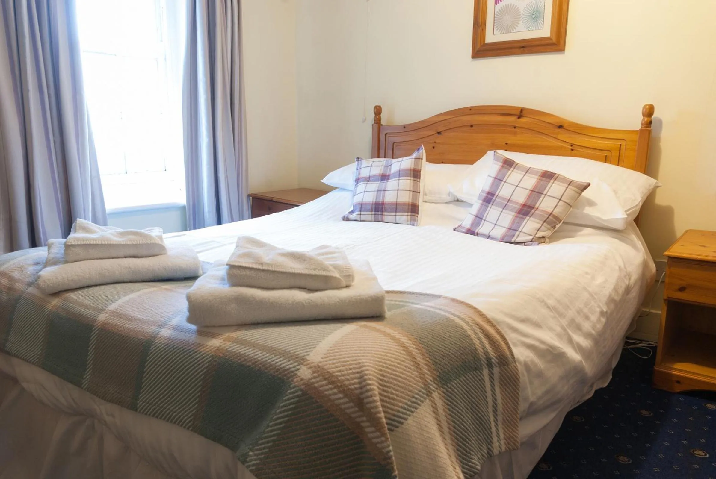 Photo of the whole room, Bed in The Dragon Hotel