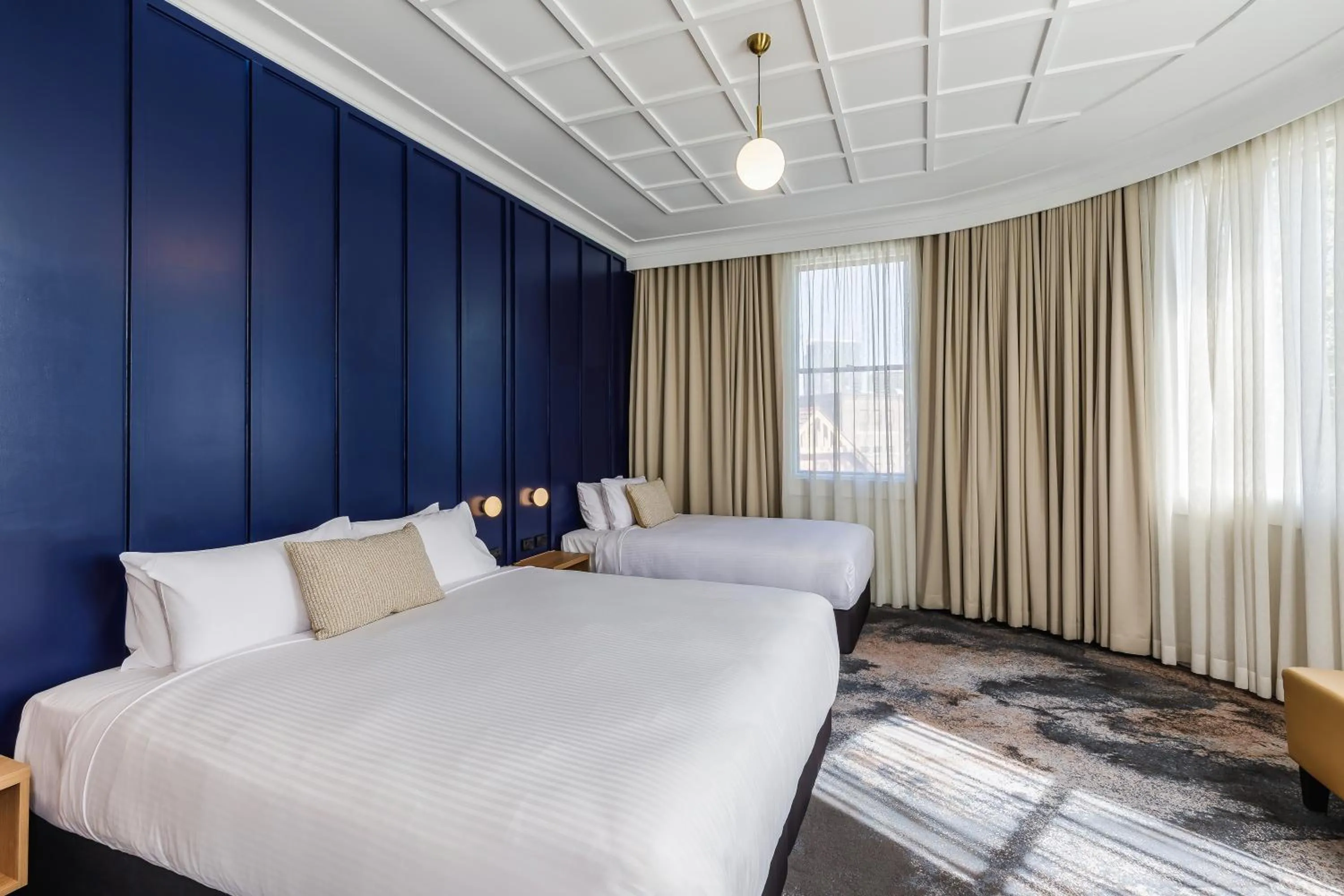 Bed in Royal Exhibition Hotel