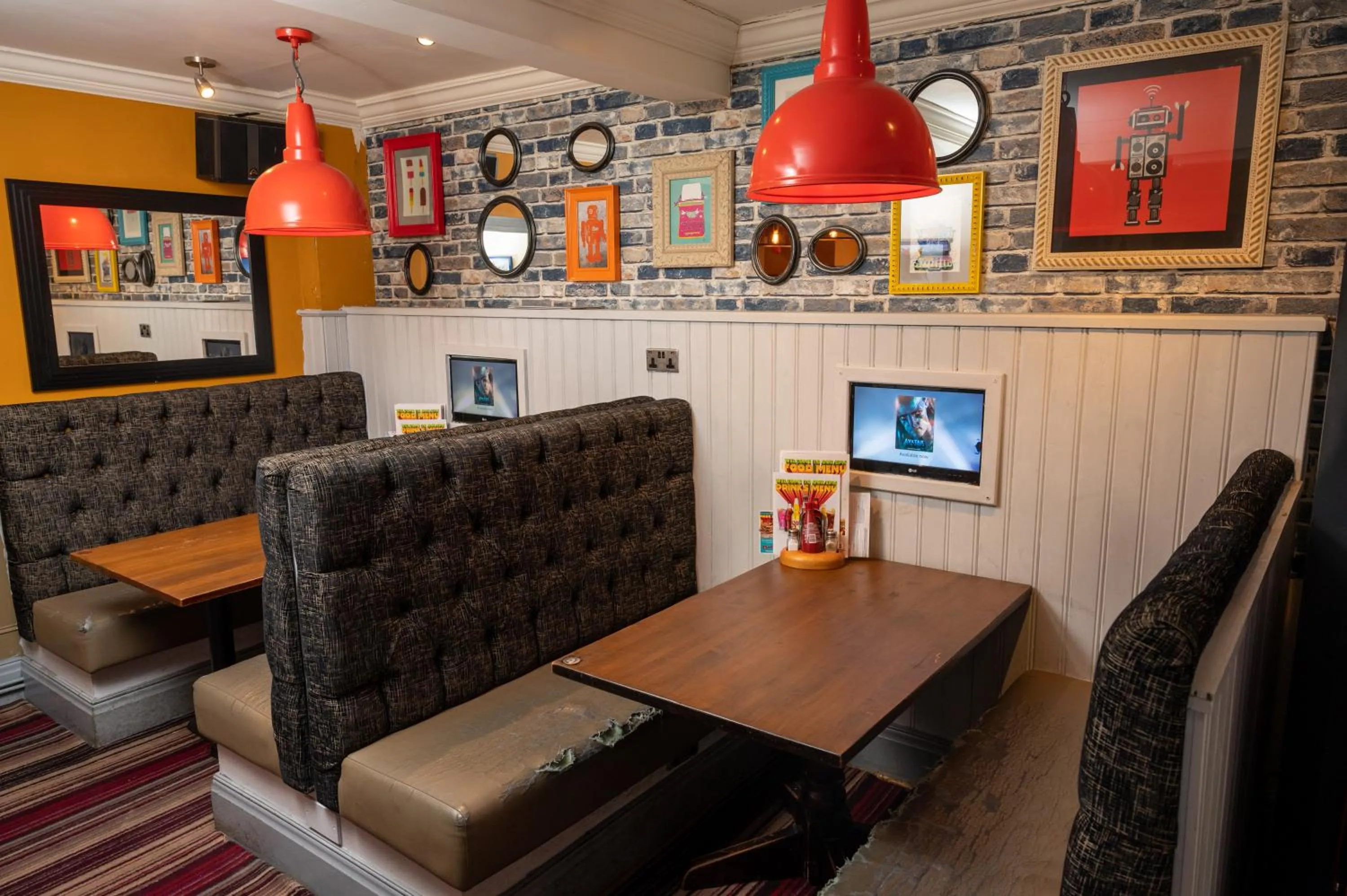 Seating area in The Fernhurst by Greene King Inns