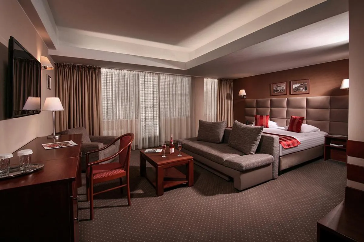 Living room, Bed in Reghina Blue Hotel