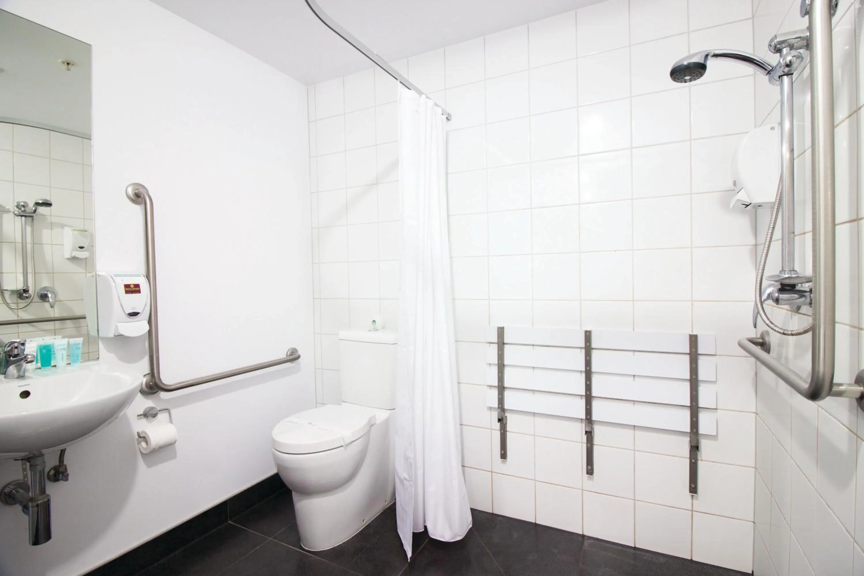 Bathroom in Nesuto St Martins Apartment Hotel