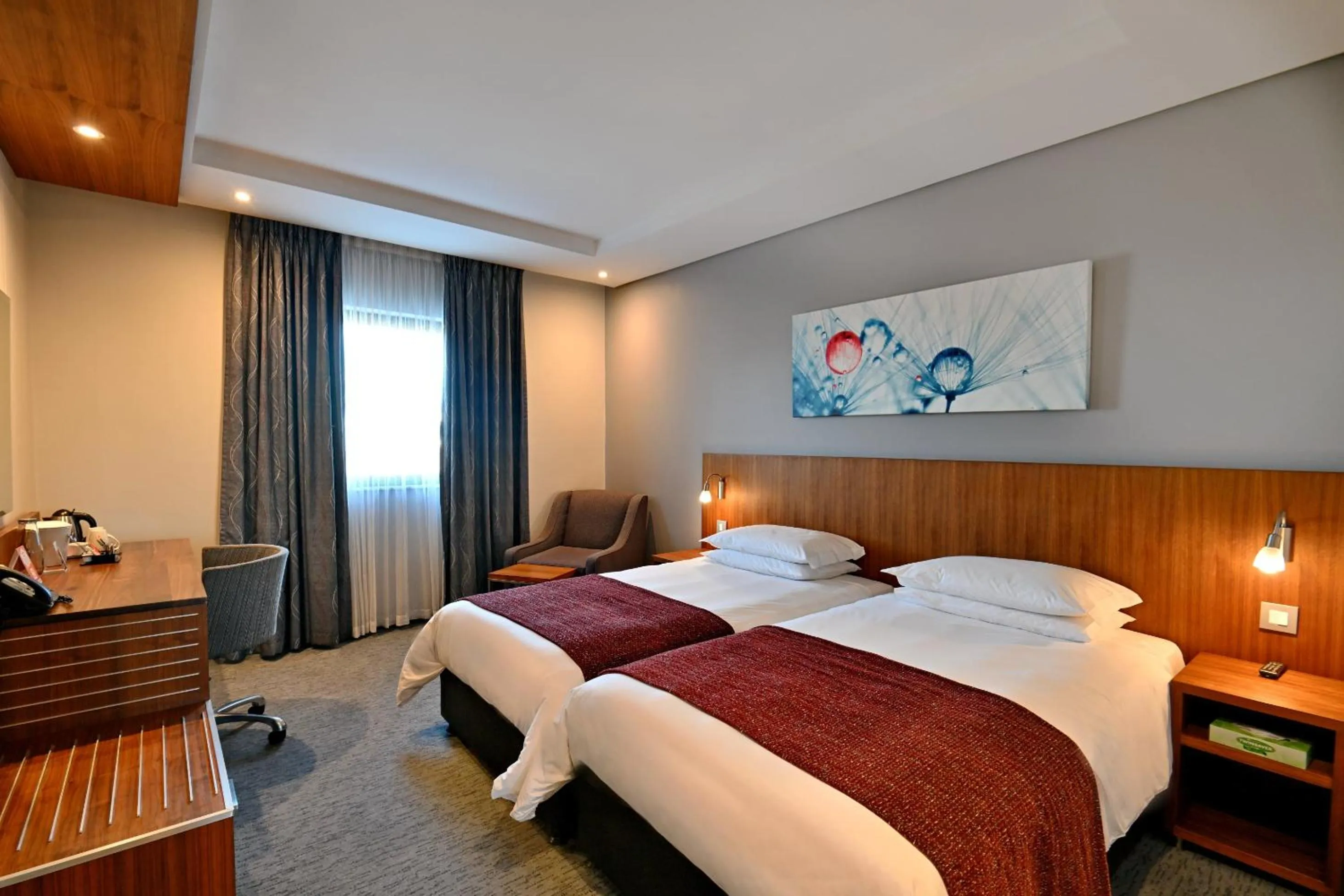 Bed in City Lodge Hotel Waterfall City