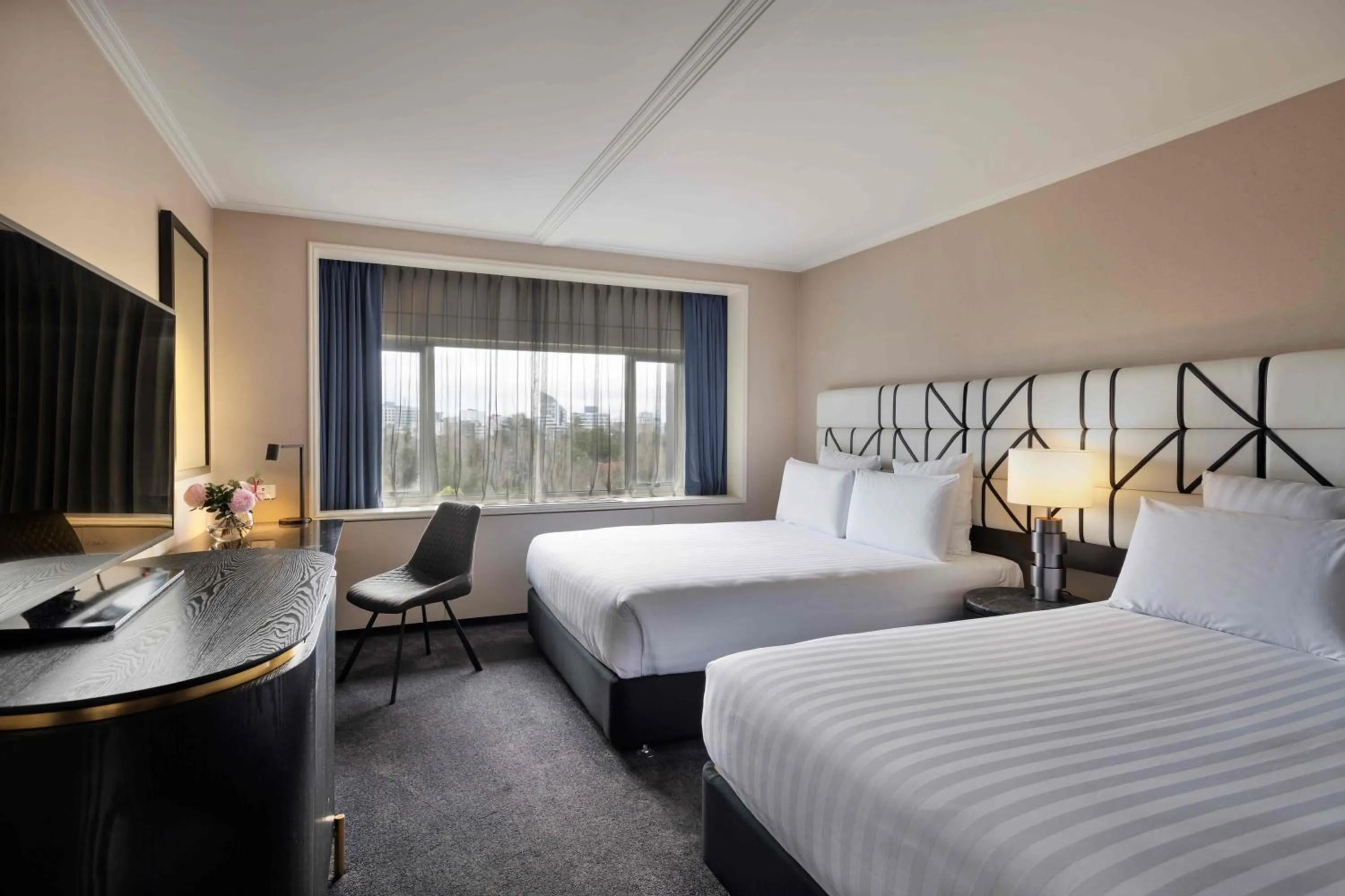 Bed in Pullman Auckland Hotel & Apartments