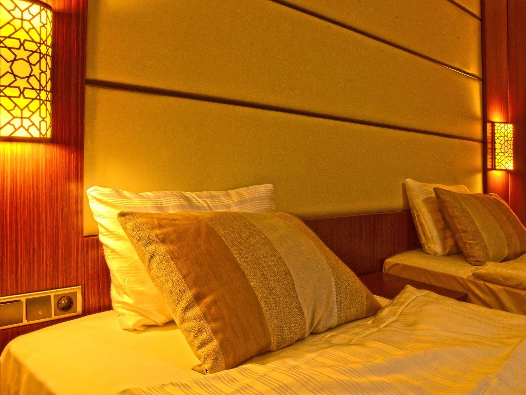 Bed in Safa Royal Museum Hotel