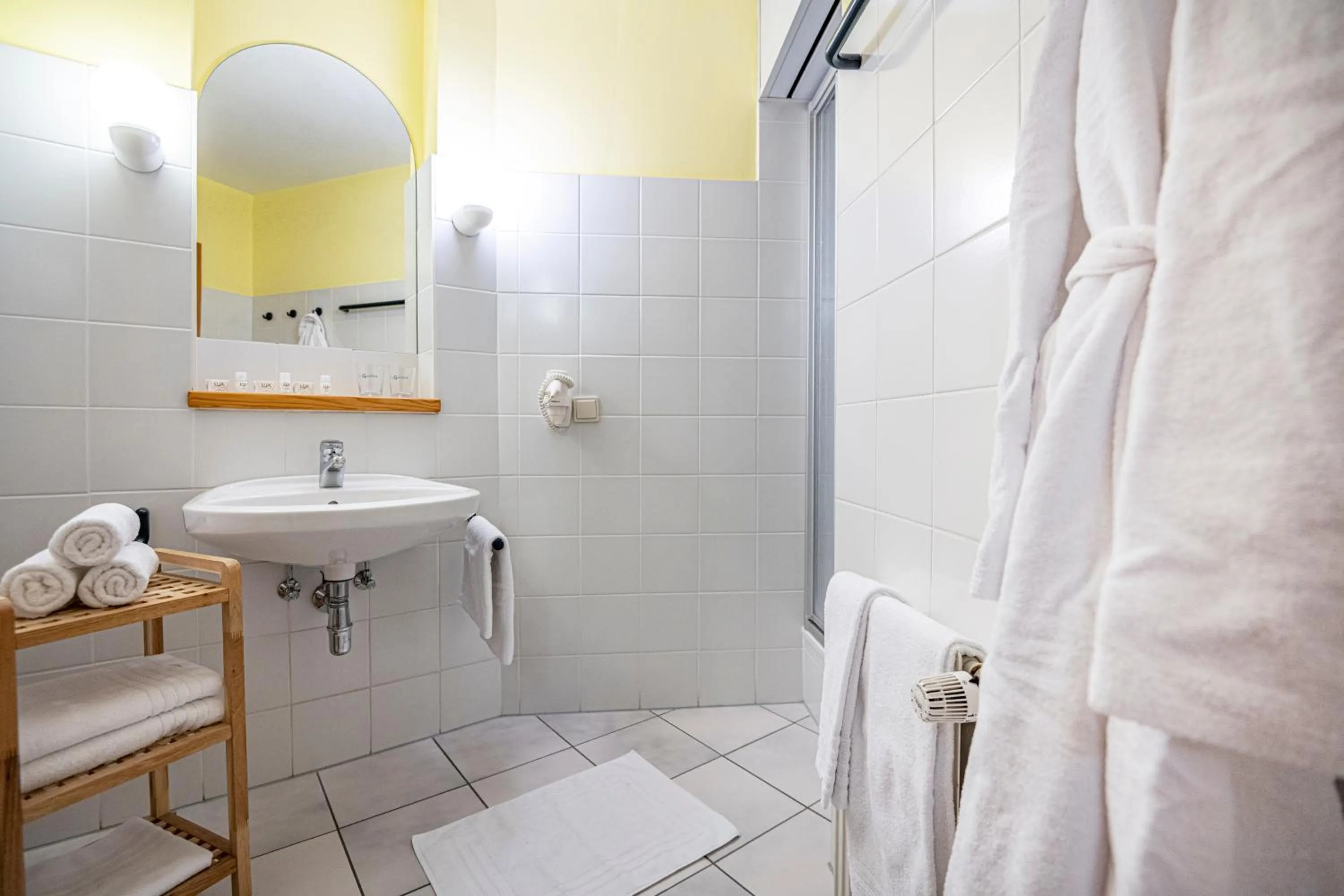 Bathroom in Hotel Das Gastein - ganzjährig inklusive Alpentherme Gastein & Sommersaison inklusive Gasteiner Bergbahnen