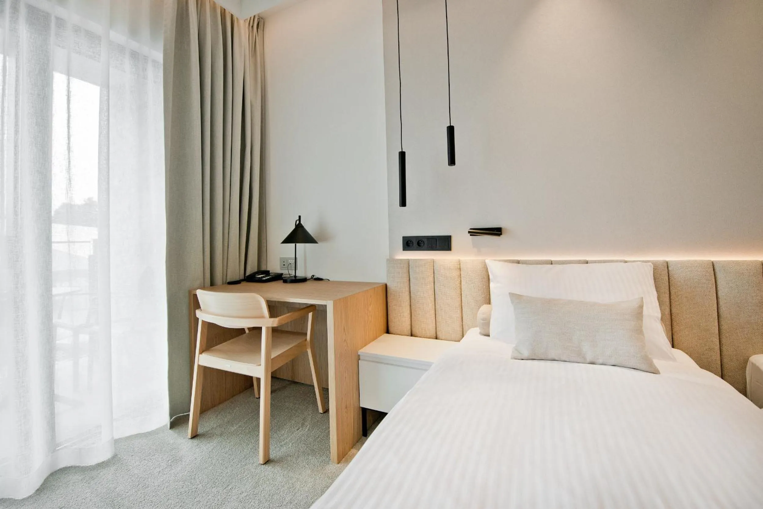 Bed in Hotel Molo Resort