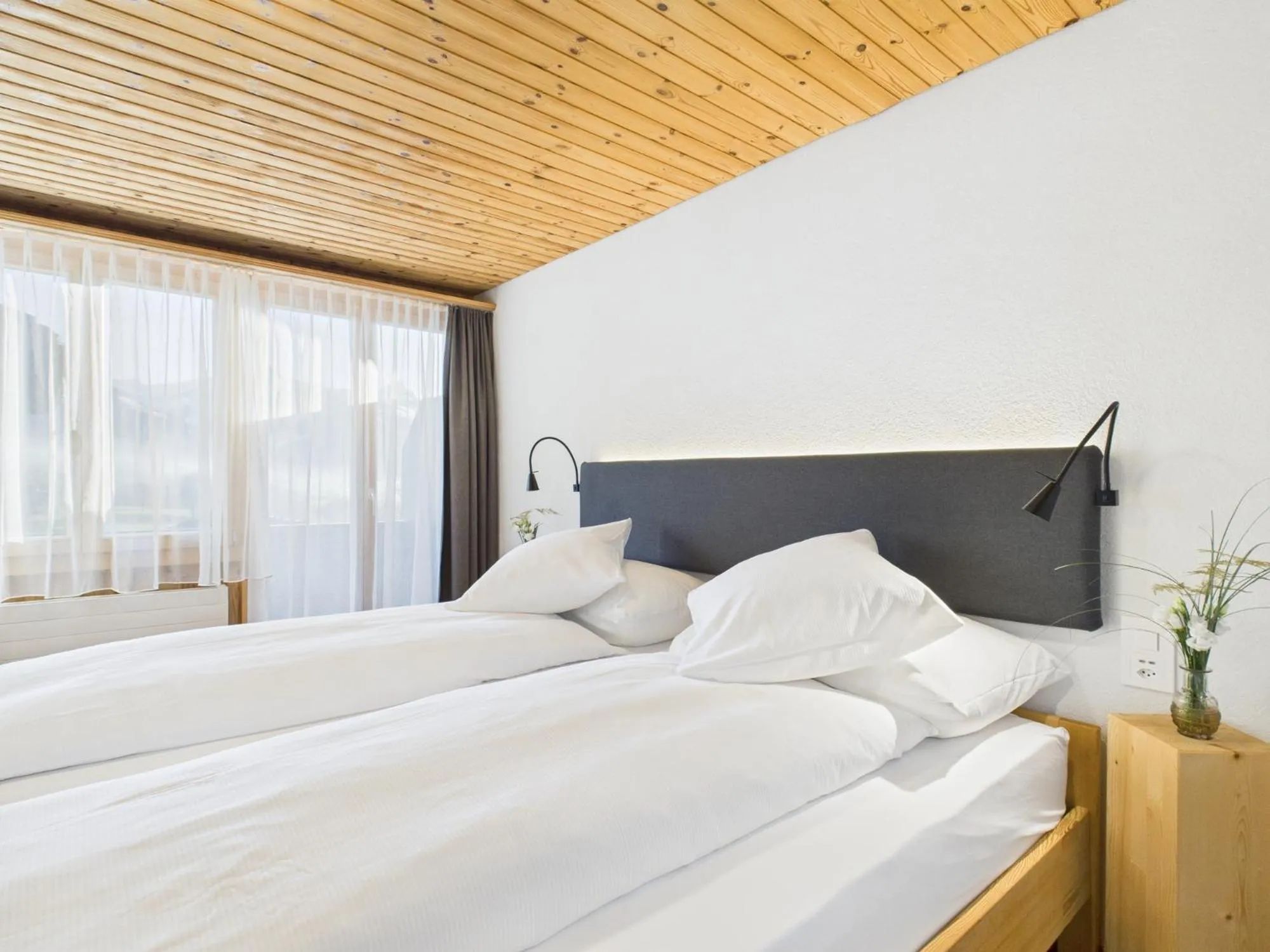 Bed in Bergblick Lodge - 3 Sterne Garni - Neueröffnung