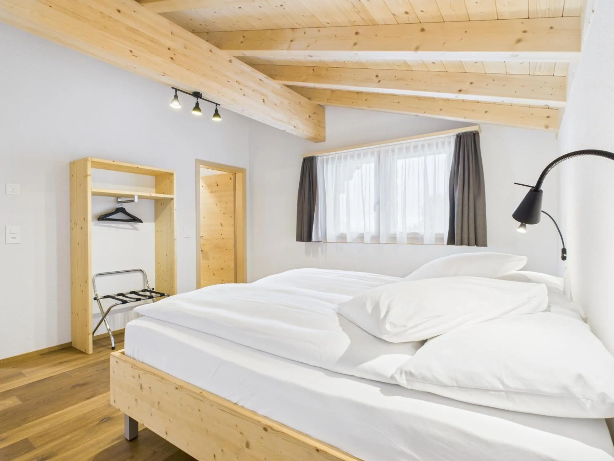 Bed in Bergblick Lodge - 3 Sterne Garni - Neueröffnung