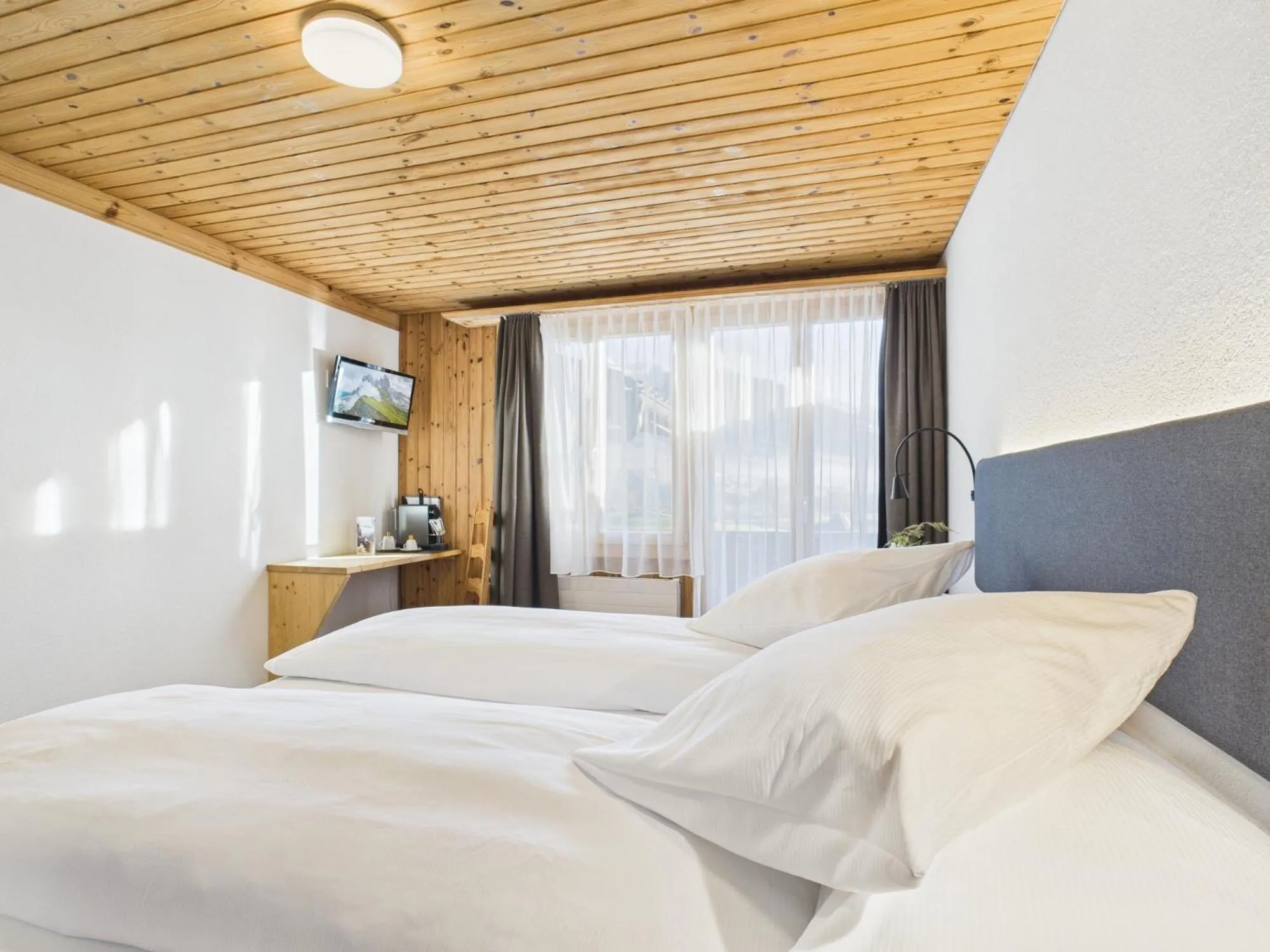 Bed in Bergblick Lodge - 3 Sterne Garni - Neueröffnung