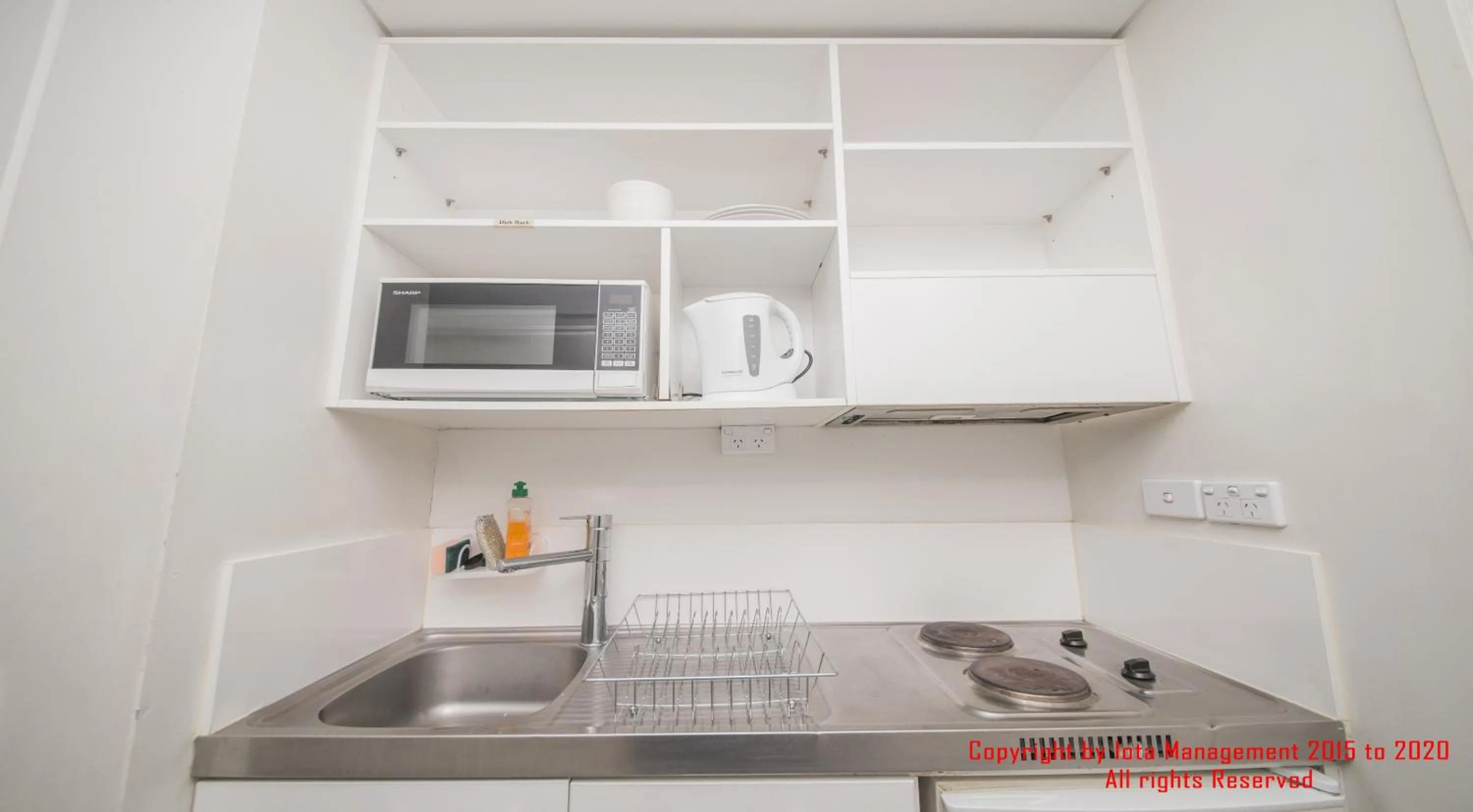 Kitchen or kitchenette in Columbia Apartments