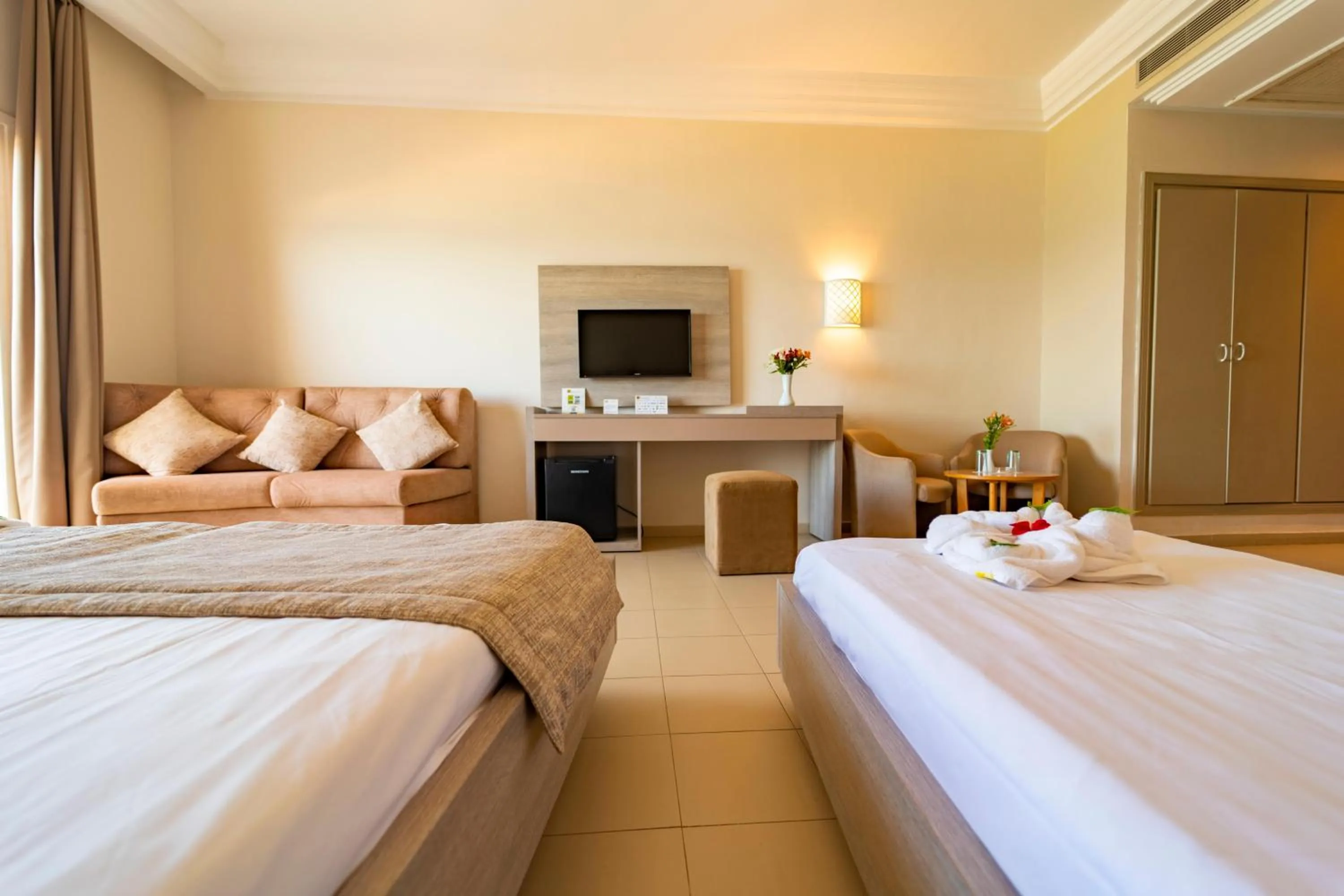 Photo of the whole room, Bed in Riadh Palms- Resort & Spa