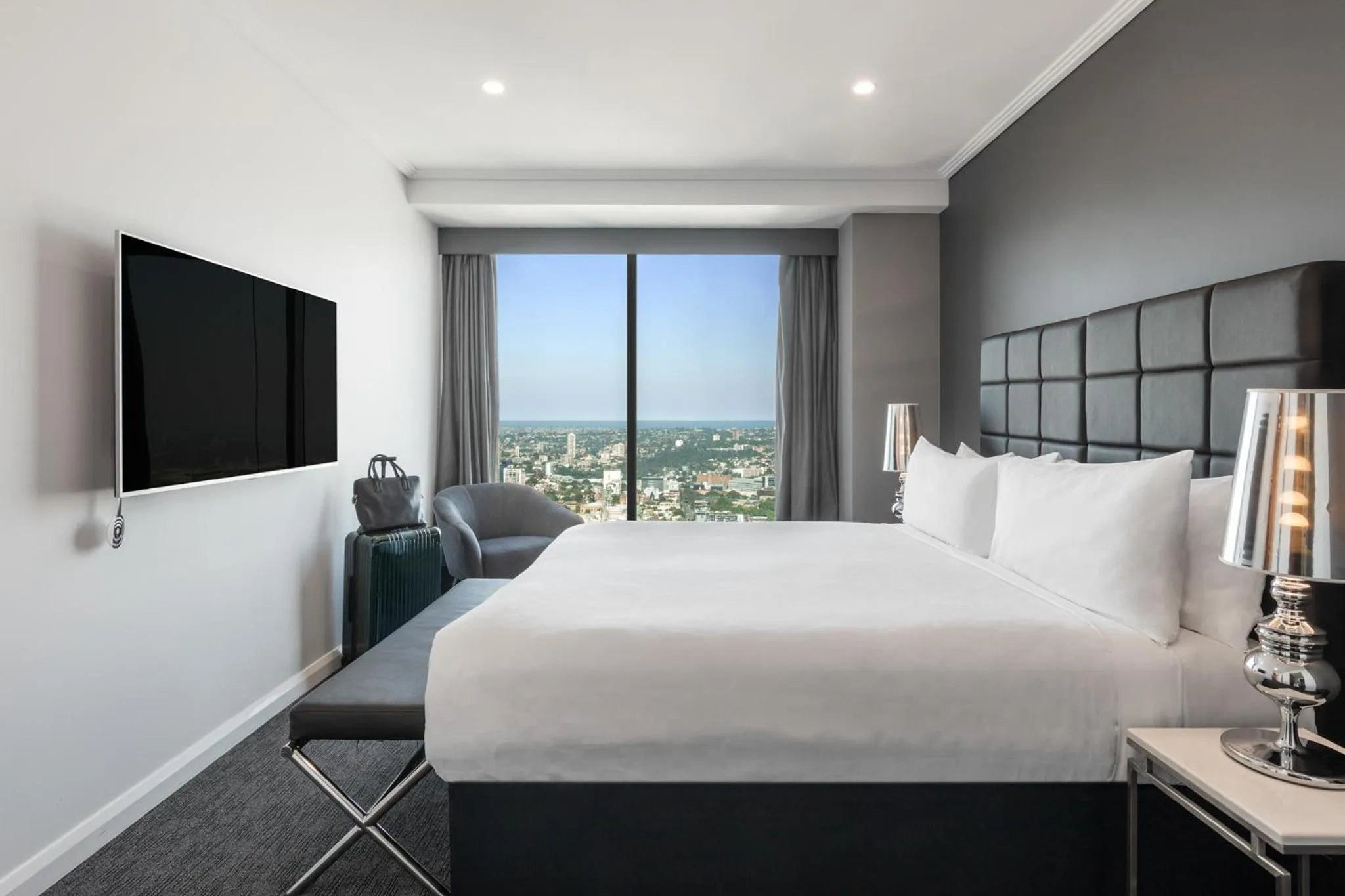 Bed in Meriton Suites World Tower, Sydney