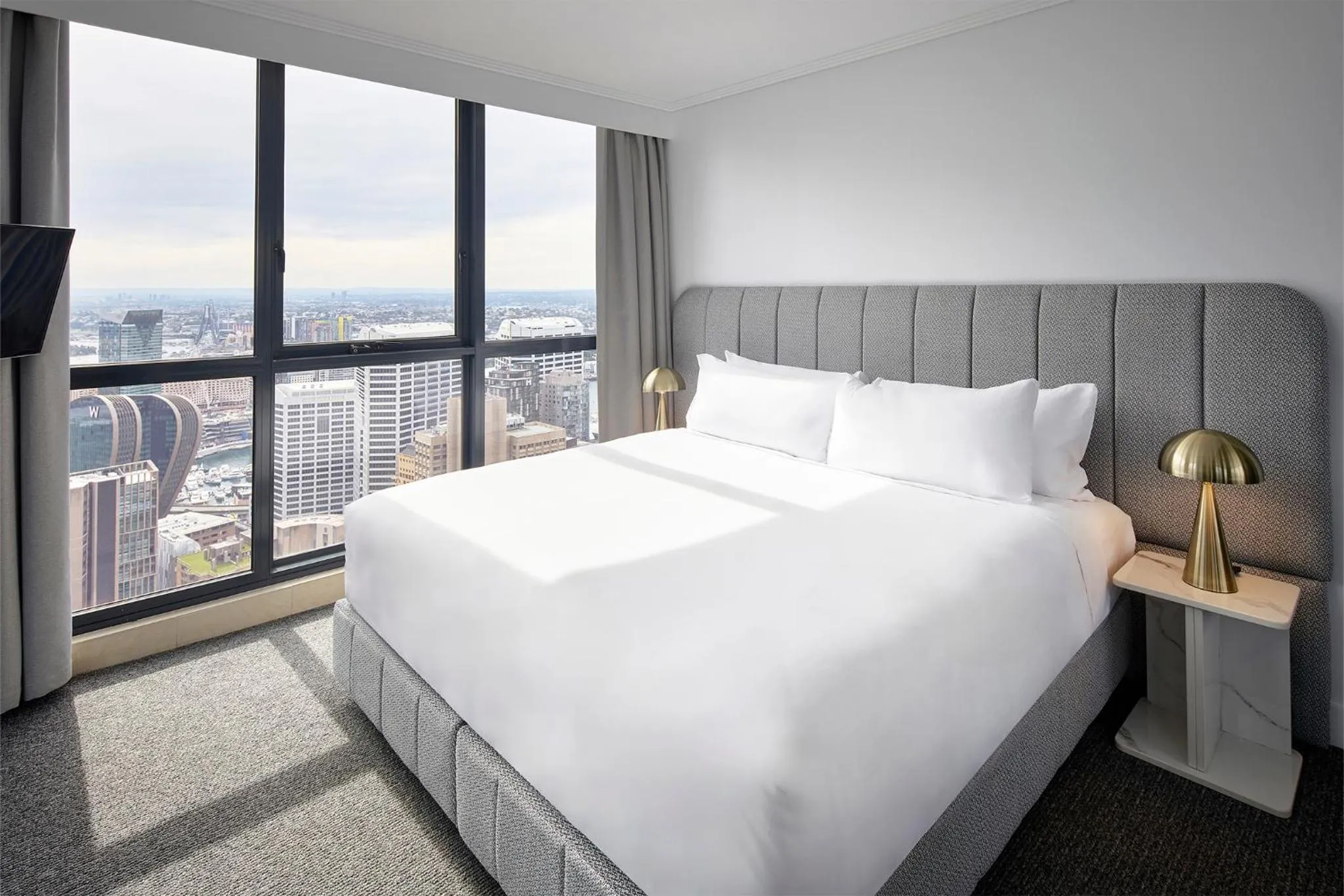 Bed in Meriton Suites Pitt Street, Sydney