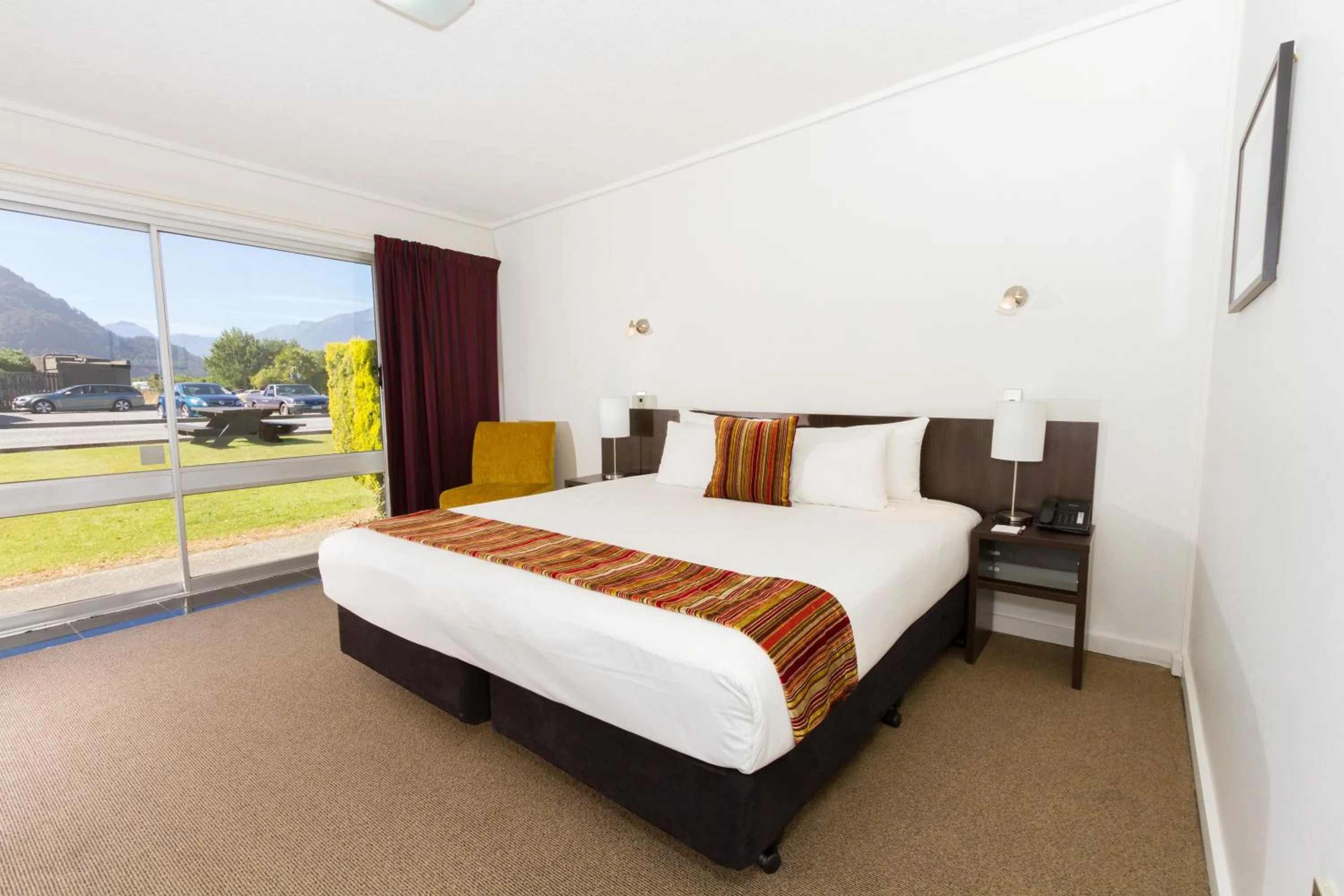 Bed in Heartland Hotel Haast