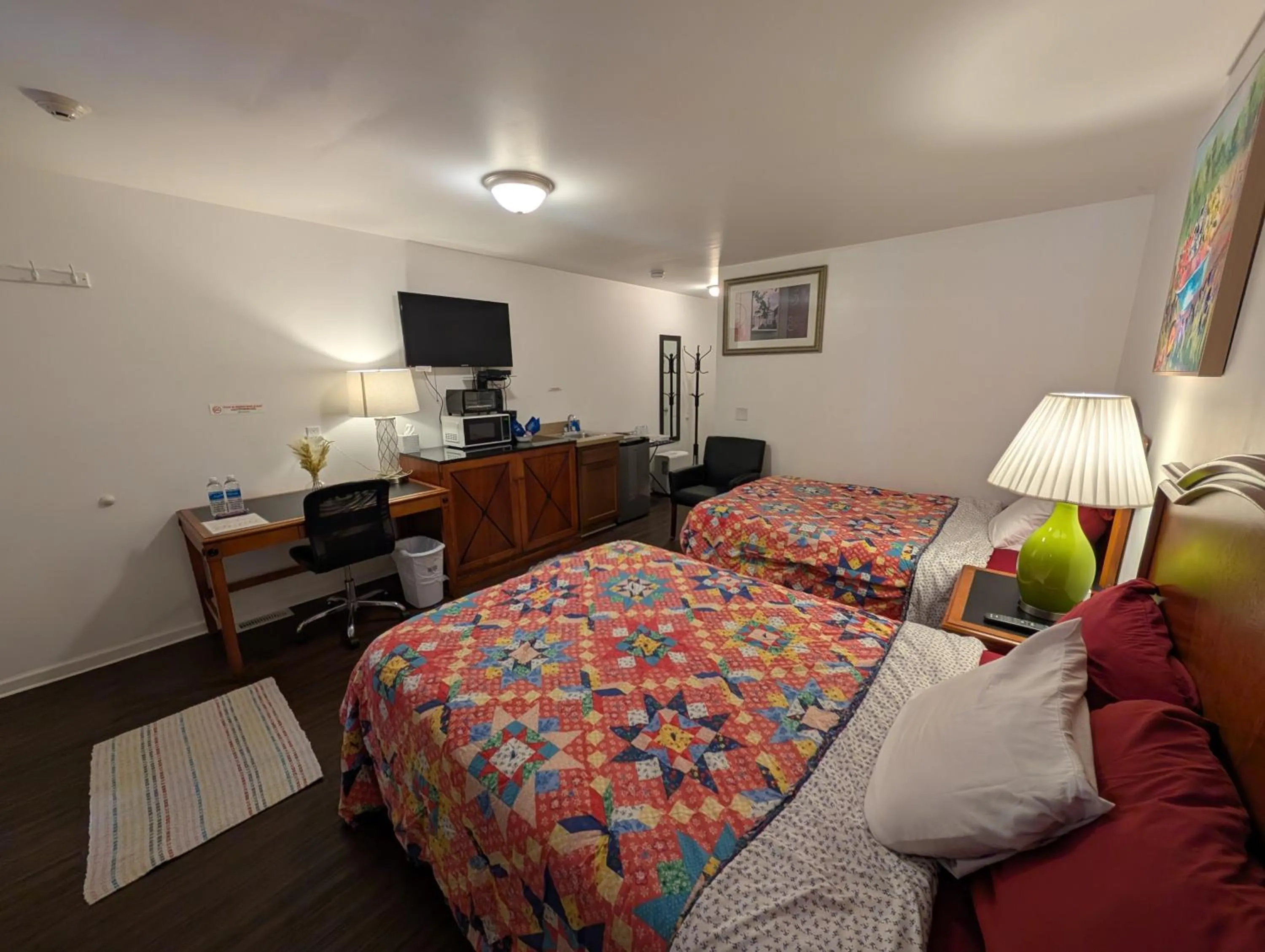 Bed in Apple Inn and Suites Cooperstown Area