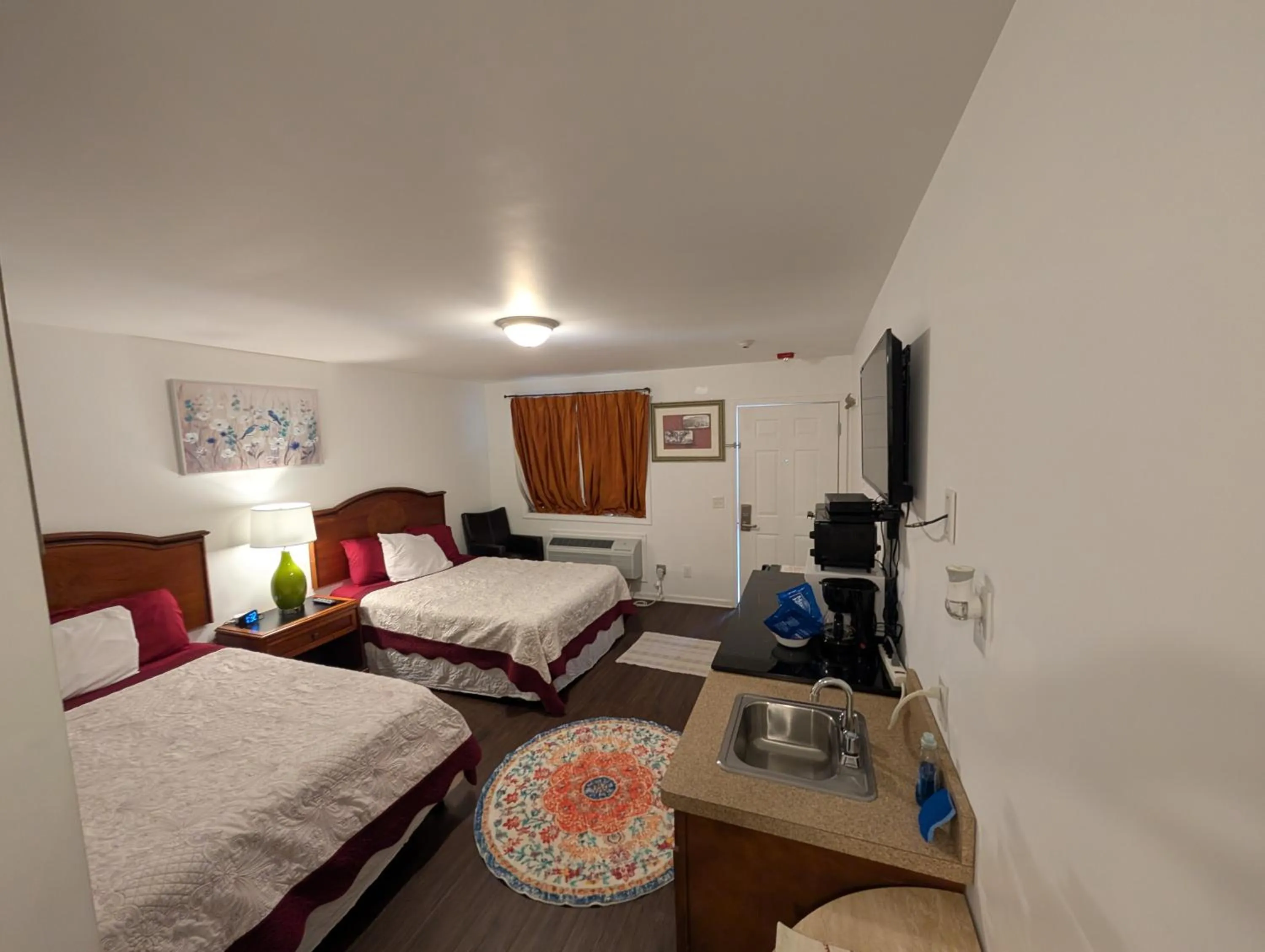 Bed in Apple Inn and Suites Cooperstown Area