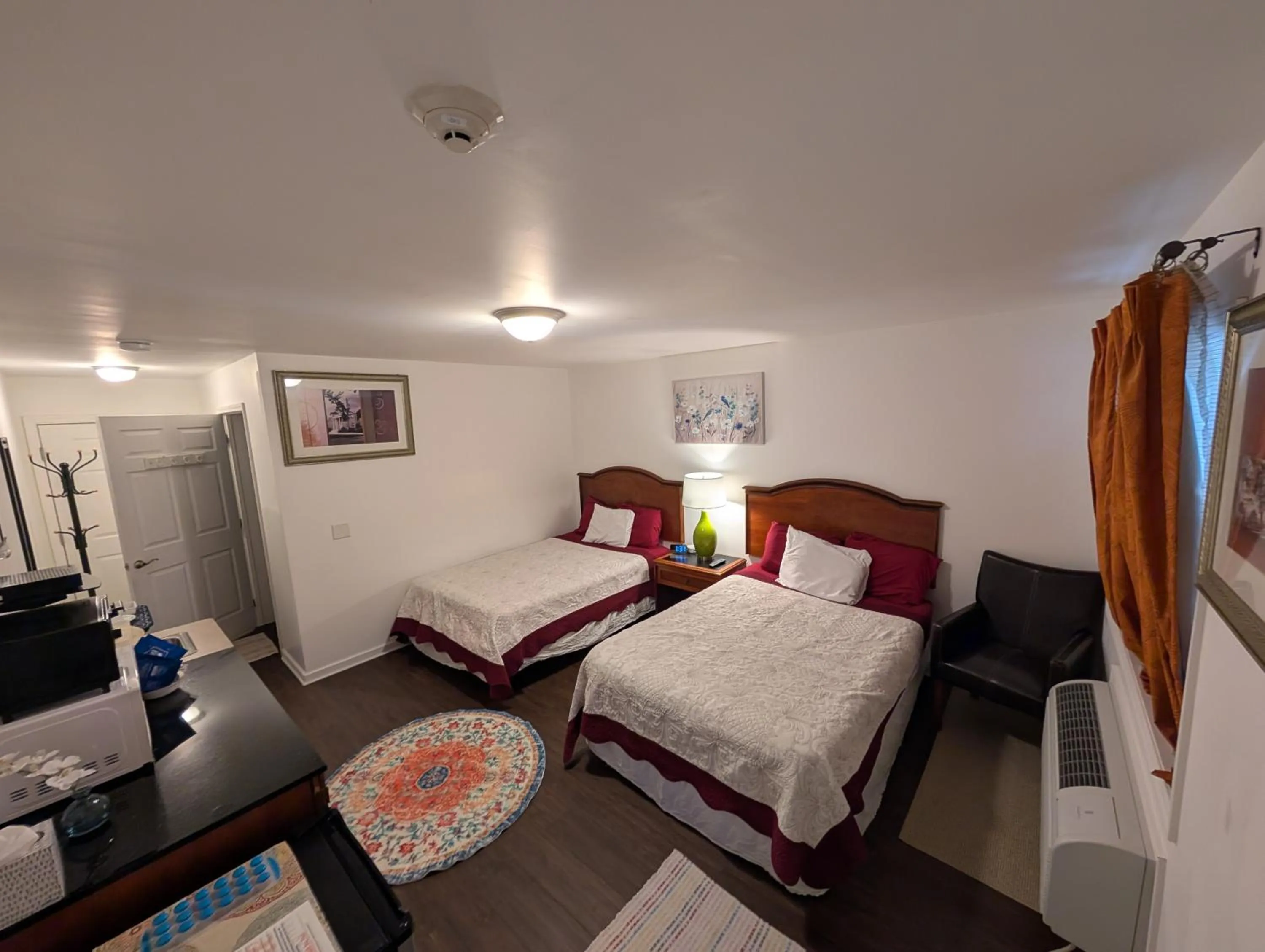 Bed in Apple Inn and Suites Cooperstown Area