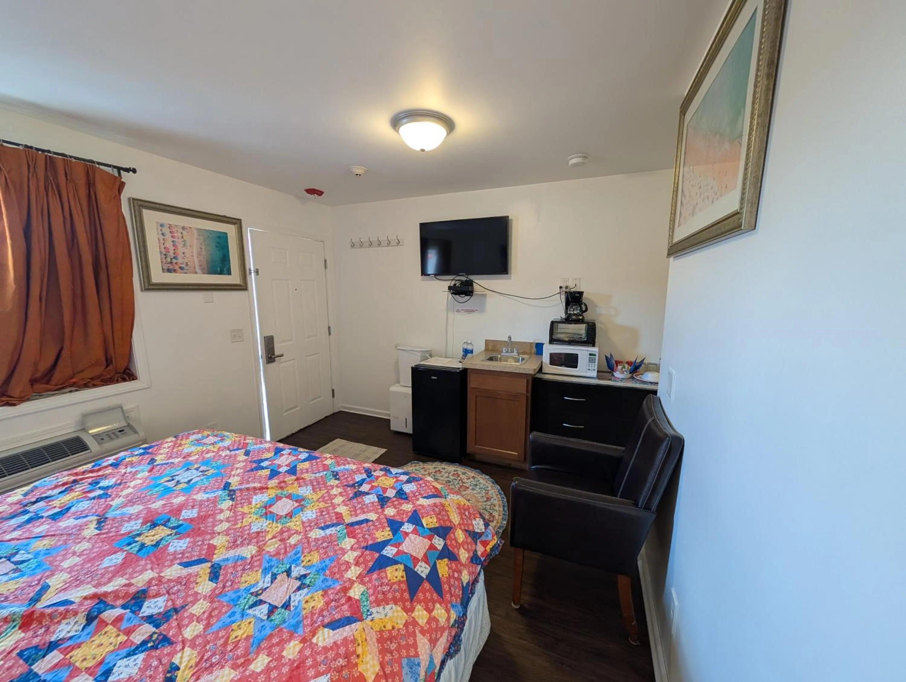 Bed in Apple Inn and Suites Cooperstown Area