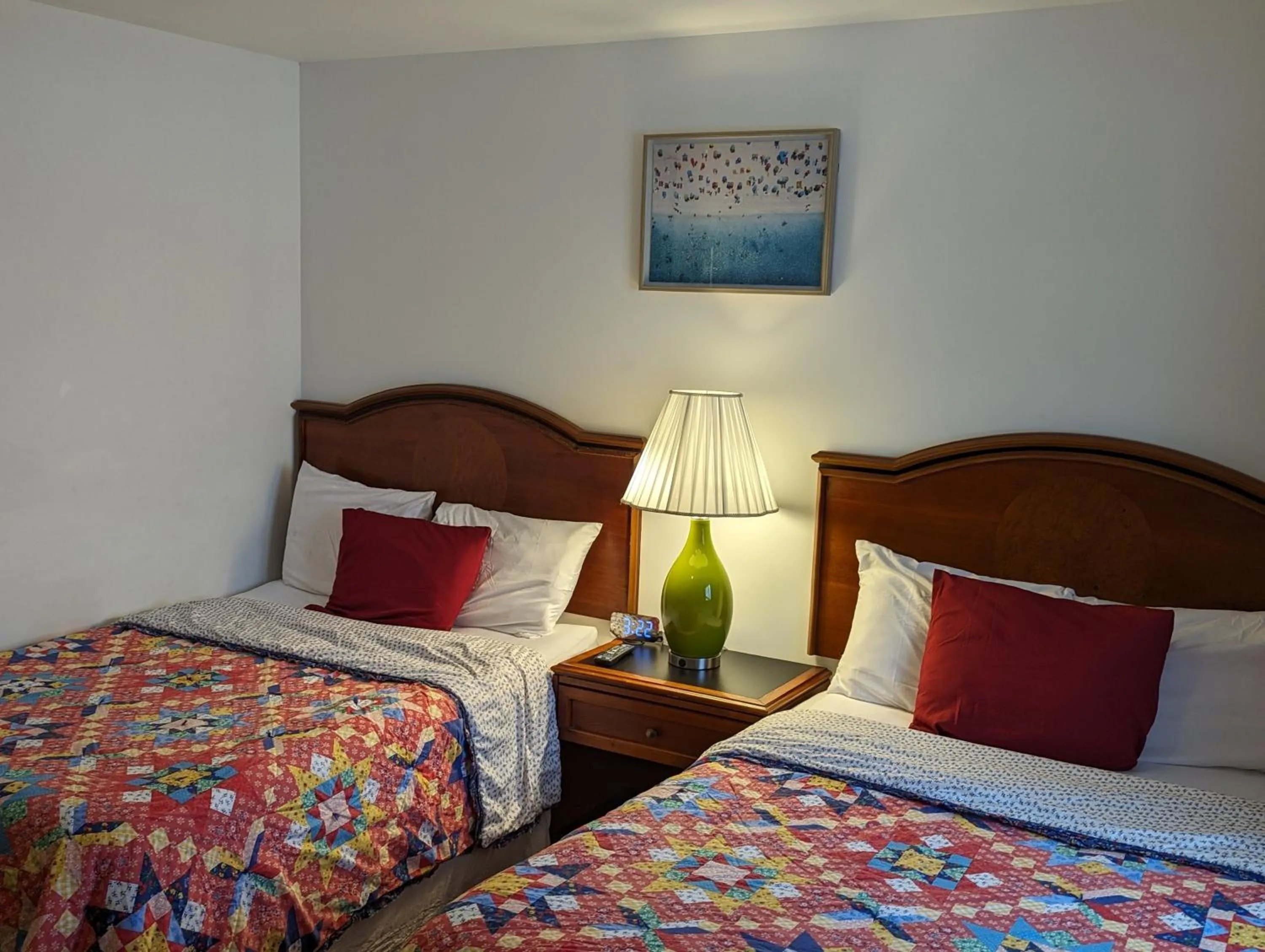 Bed in Apple Inn and Suites Cooperstown Area