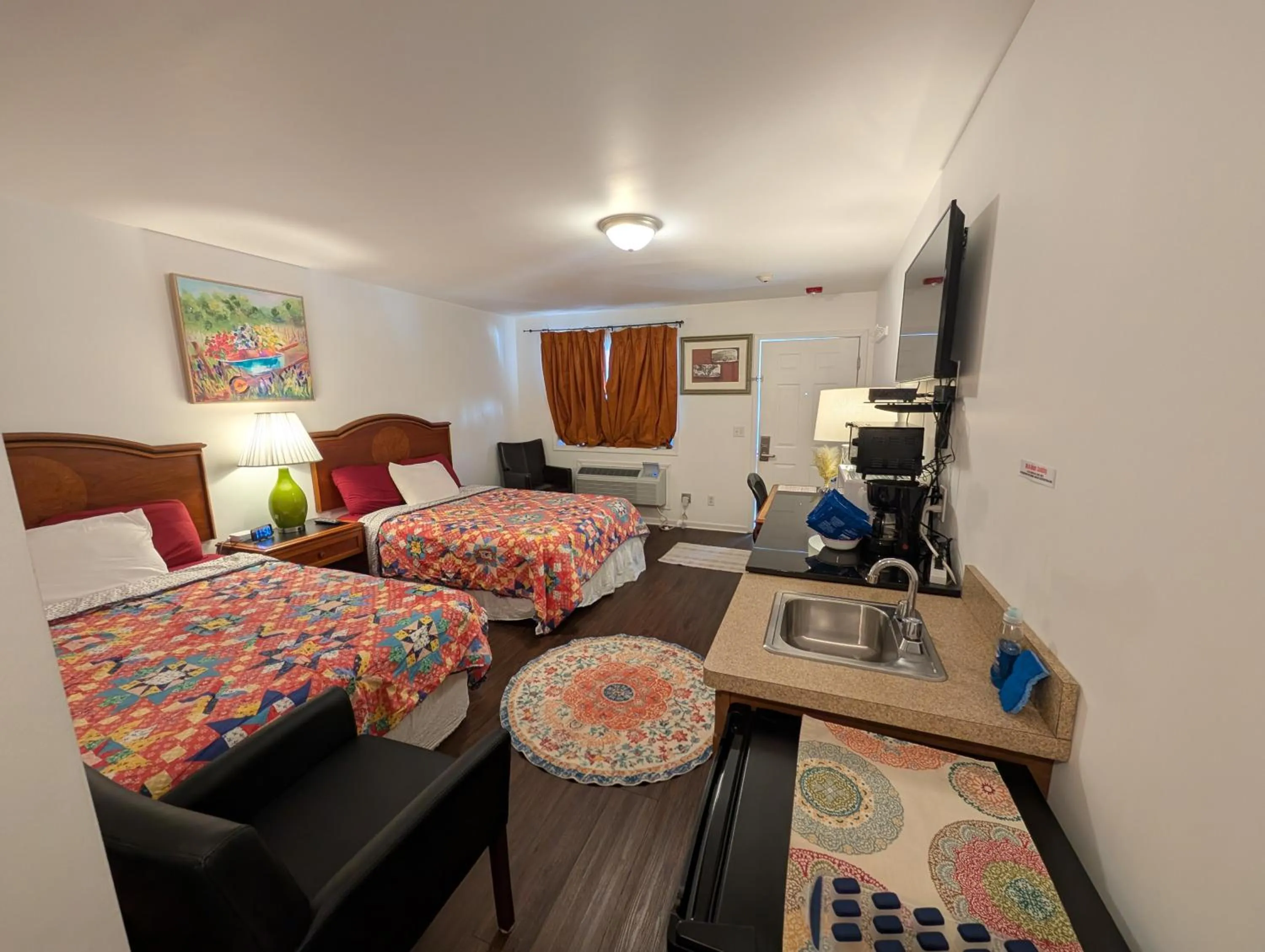 Bed in Apple Inn and Suites Cooperstown Area