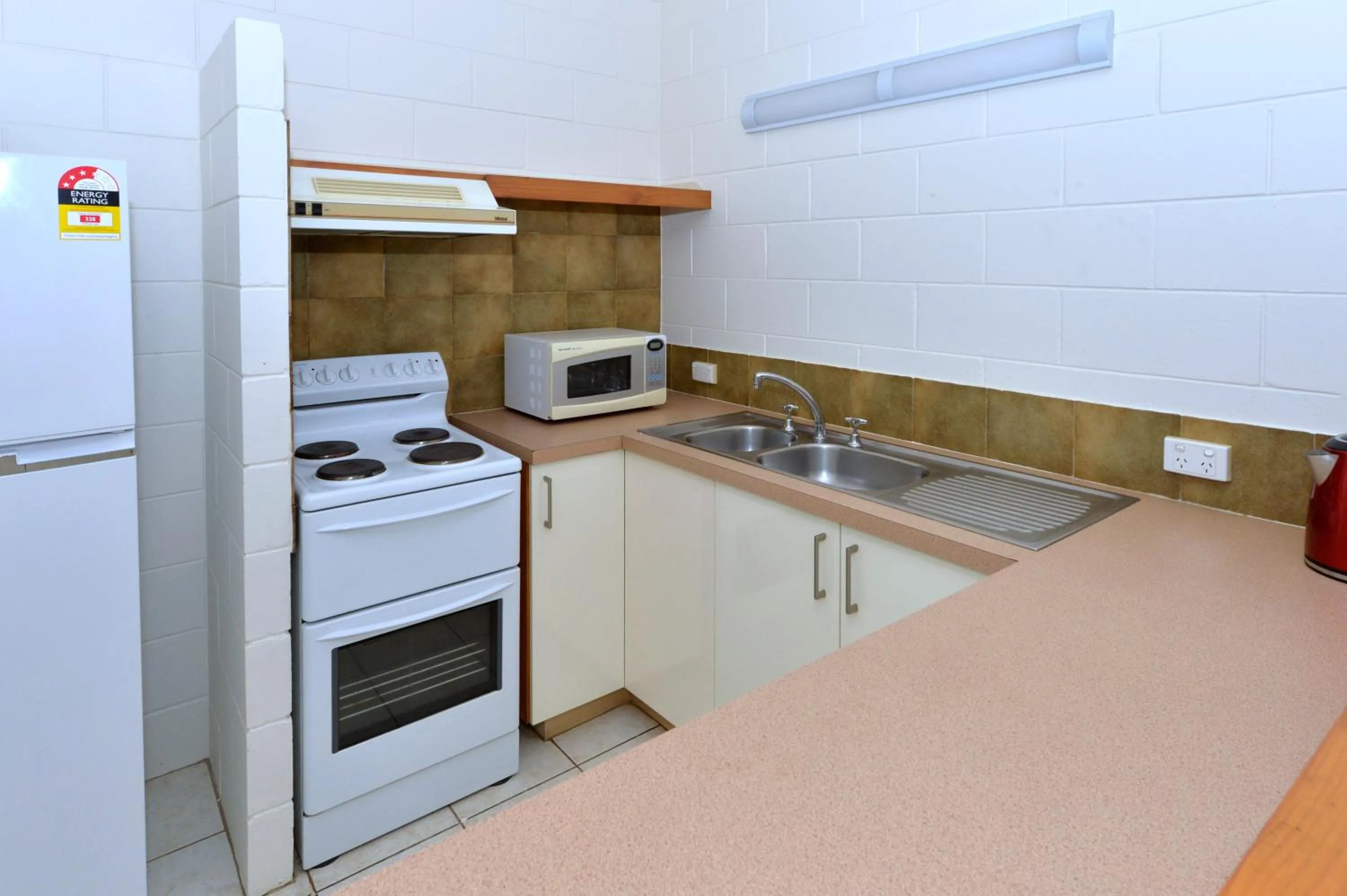 Kitchen or kitchenette in City Gardens Apartments