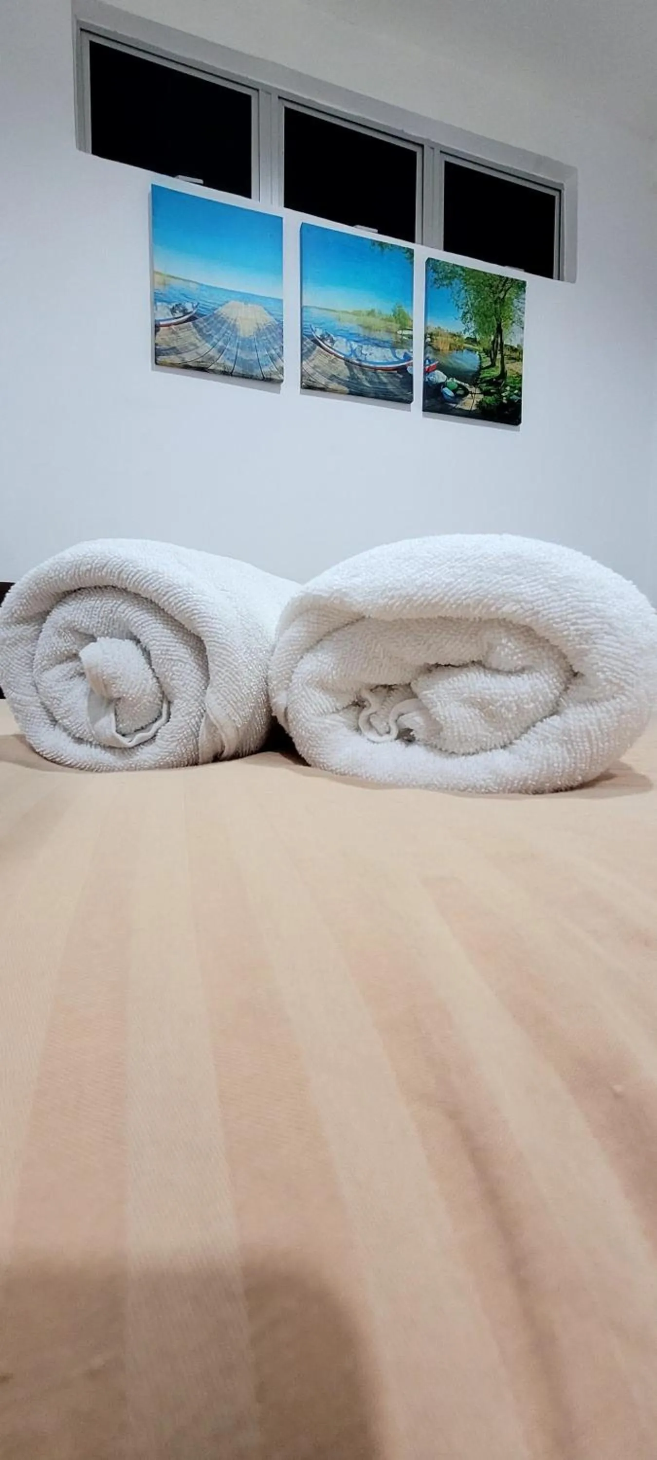 towels, Bed in Api-Api GuestHouse
