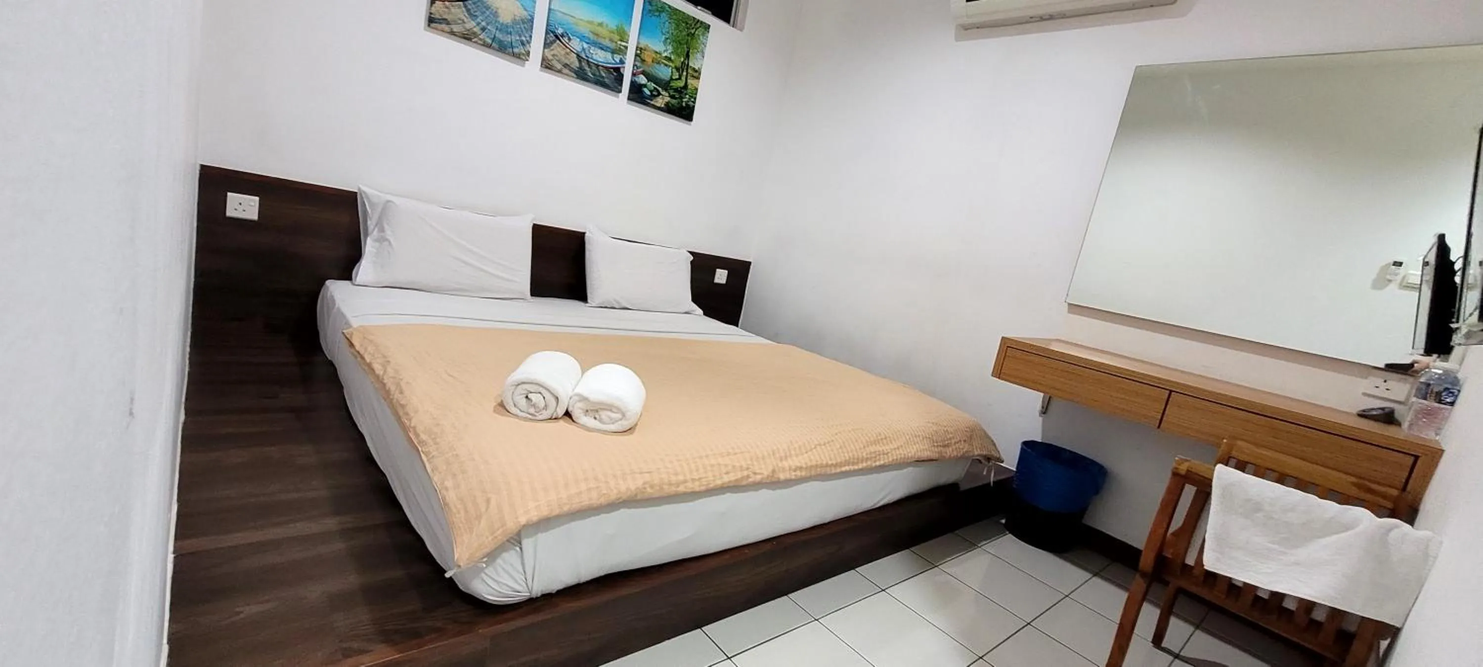 Bed in Api-Api GuestHouse
