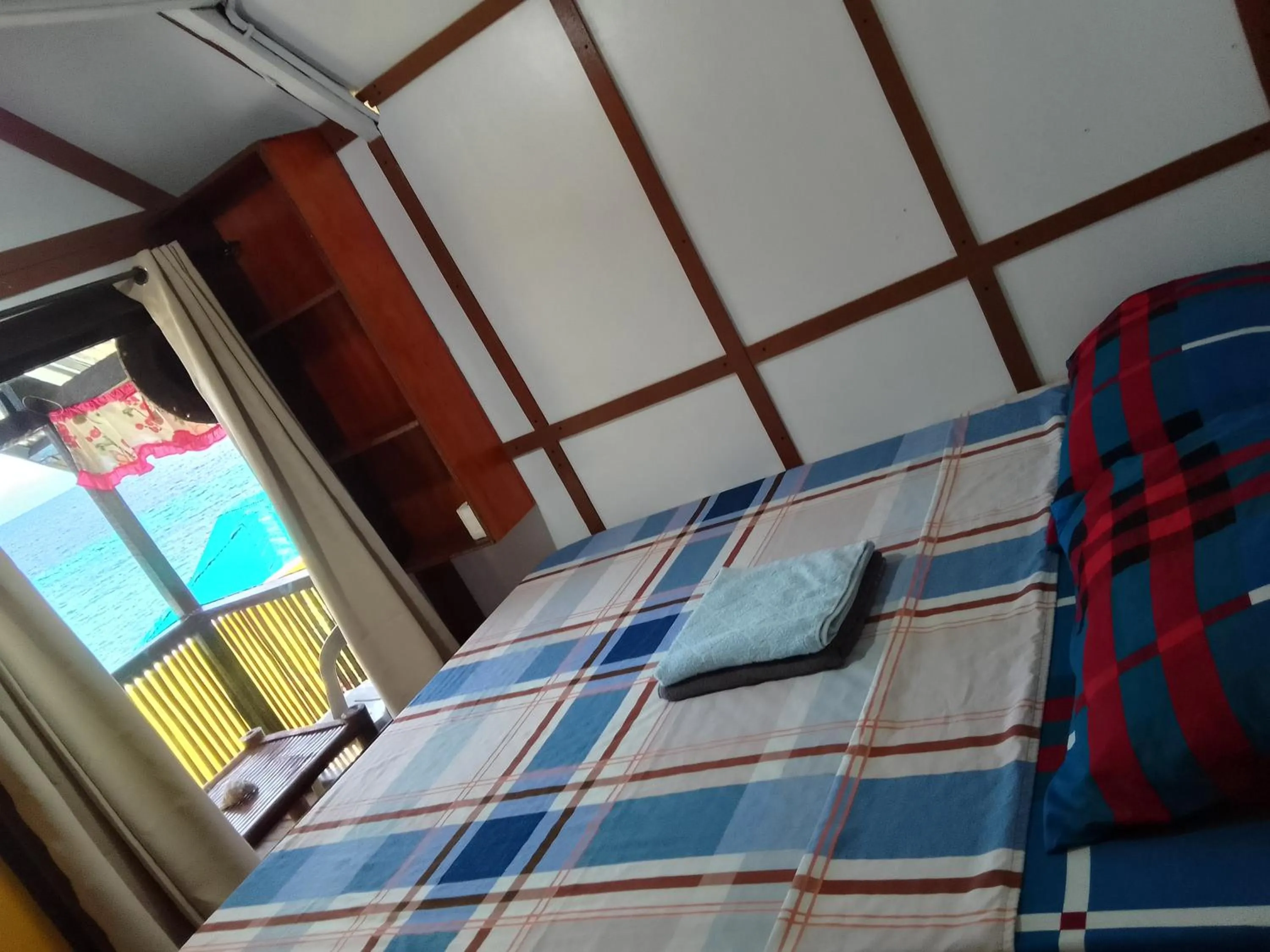 Bed in MLK Bamboo Beachhouse