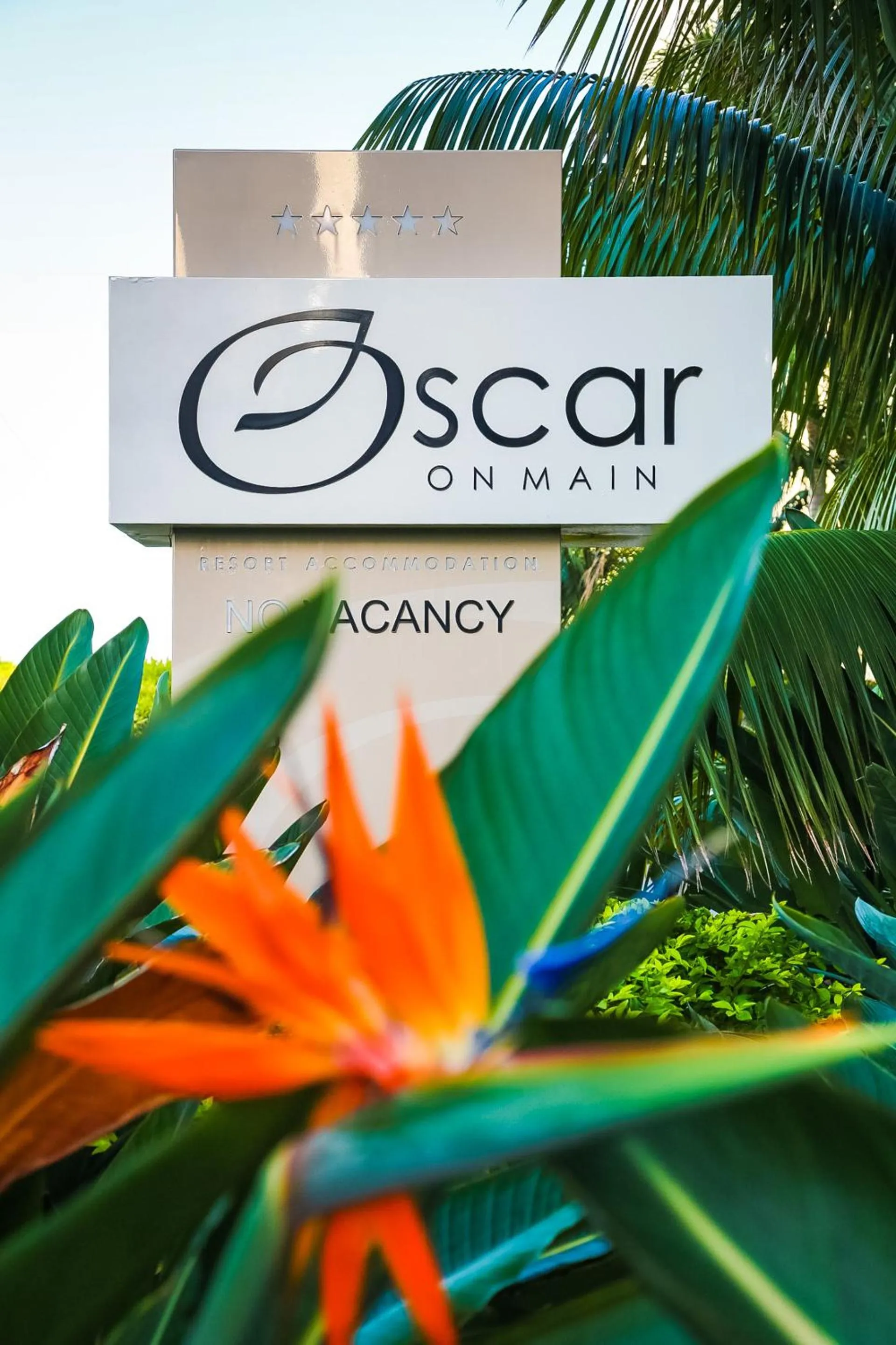 Property logo or sign in Oscar On Main Beach Resort