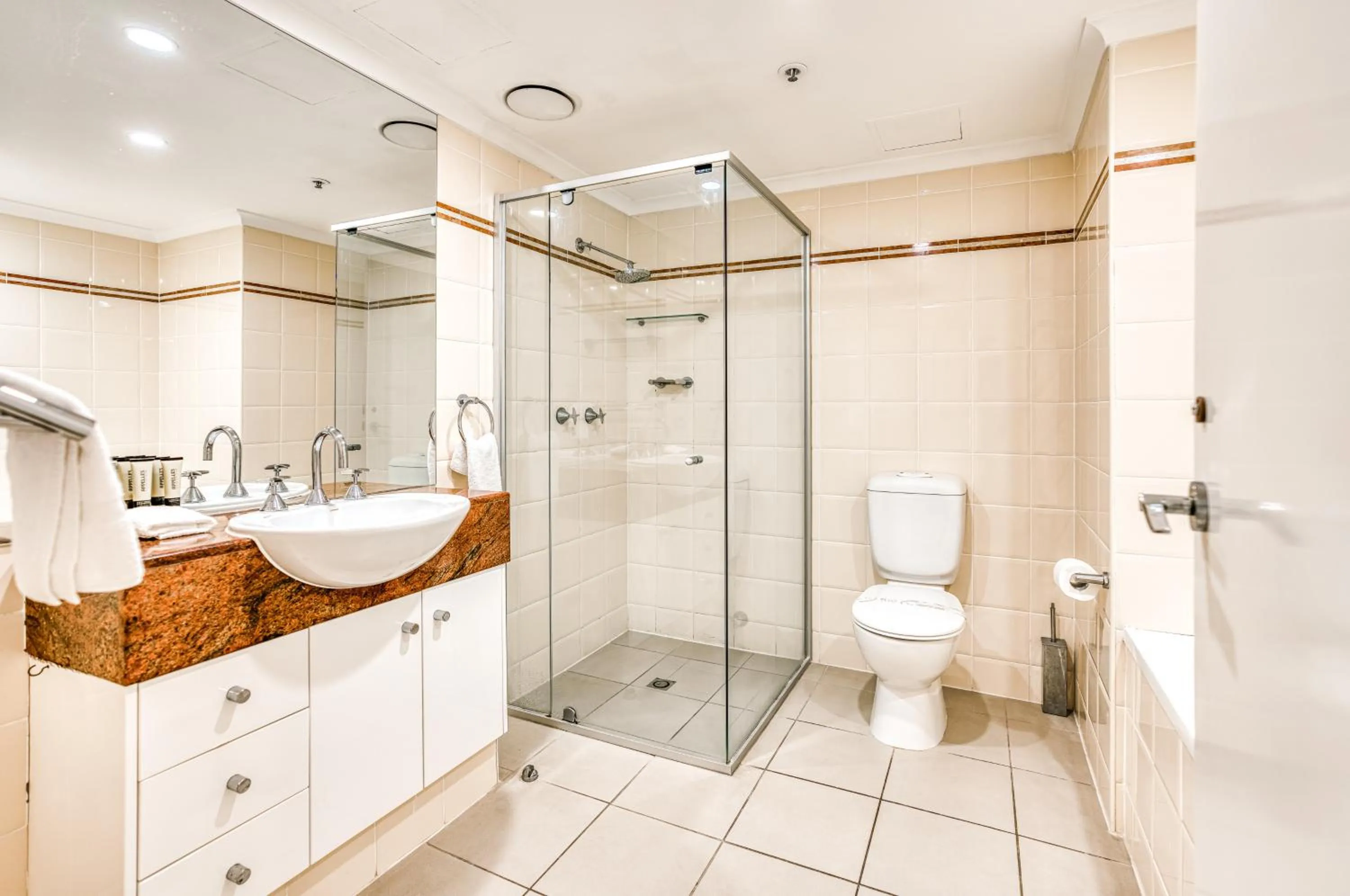 Shower in Oscar On Main Beach Resort