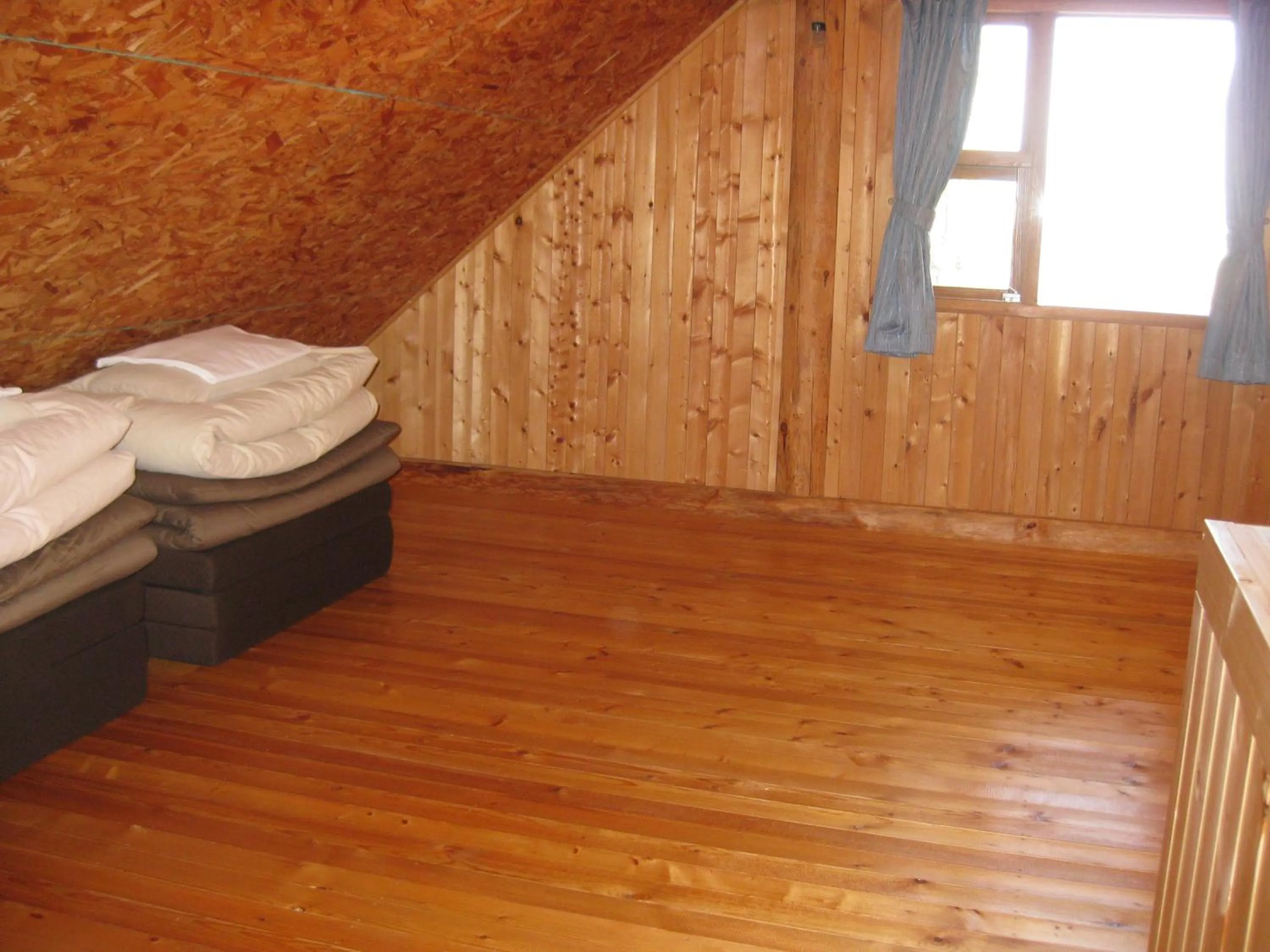 Bed in Log Cottage Himawari