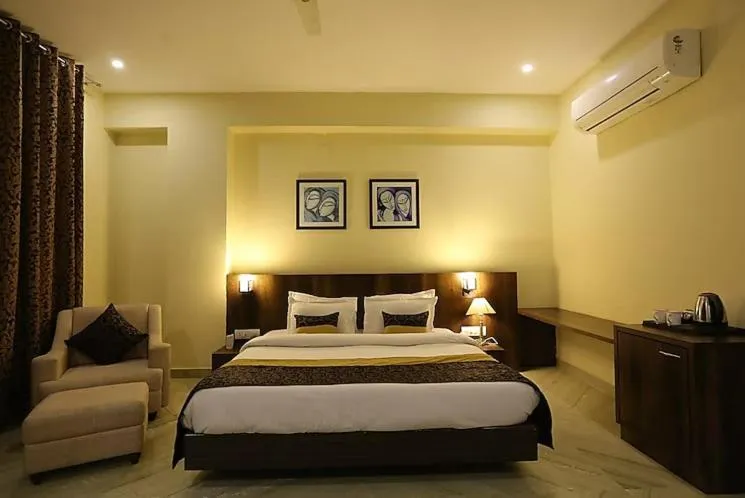 Bed in Regenta Central Mewargarh, Near Biological park
