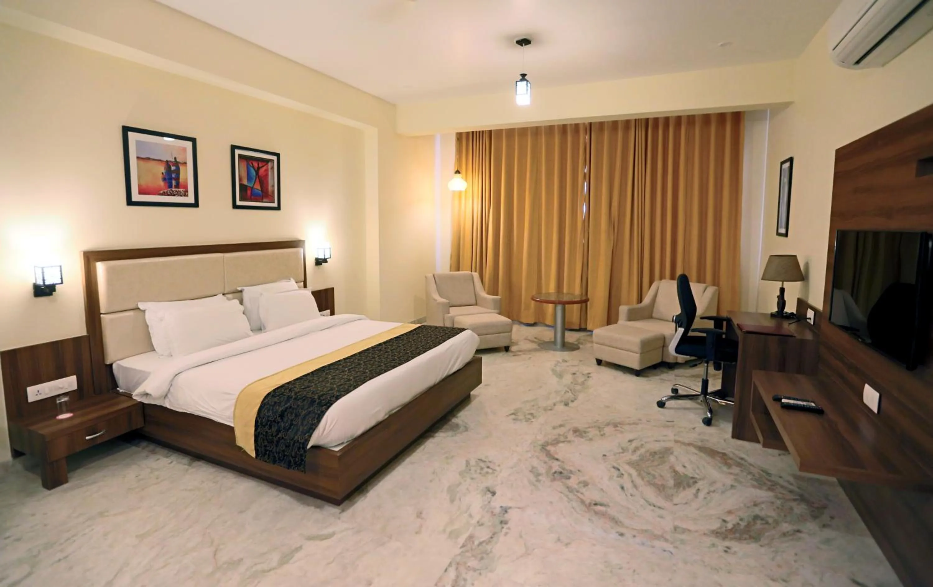 Photo of the whole room, Bed in Regenta Central Mewargarh, Near Biological park