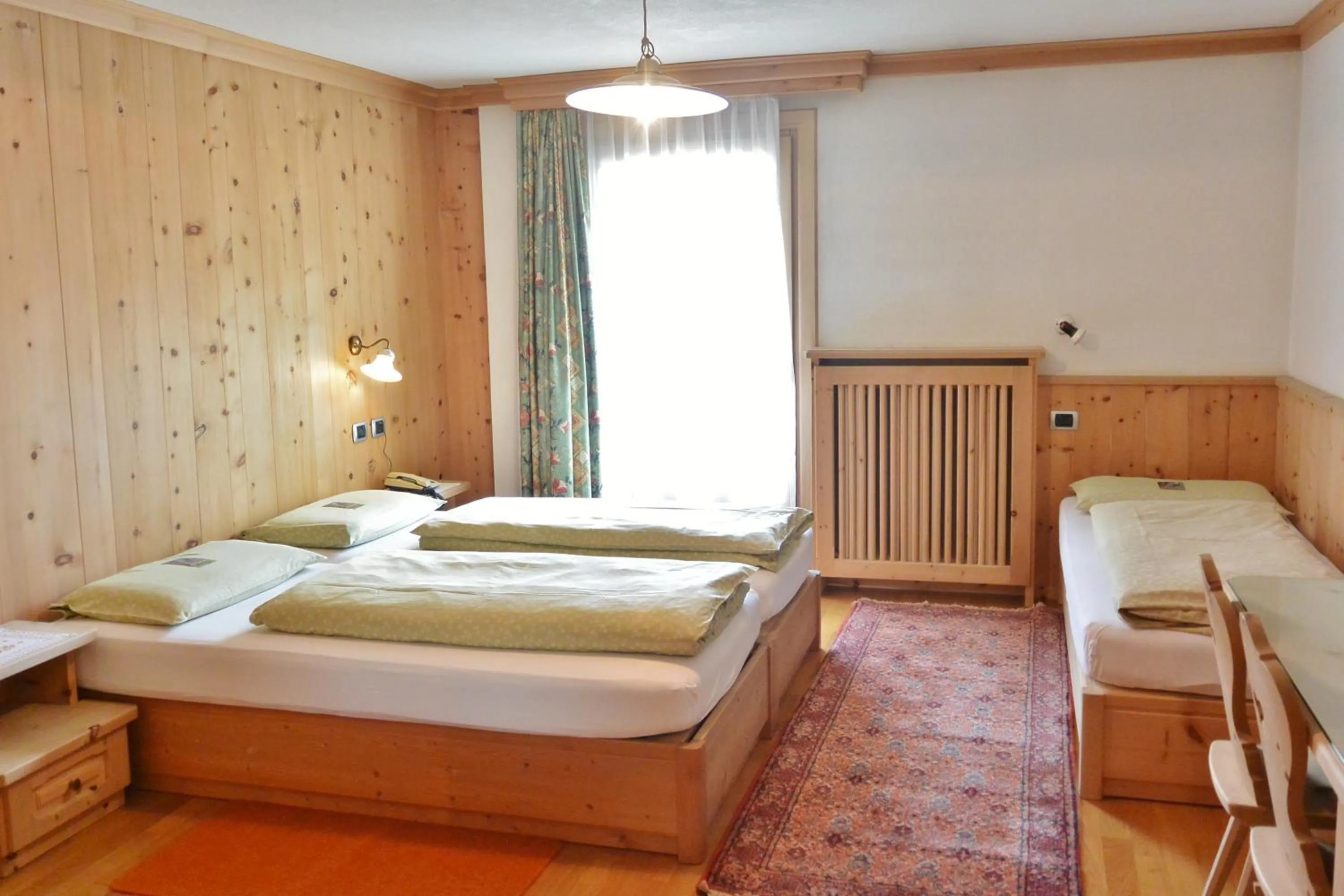 Bed in Hotel Garnì al Plan